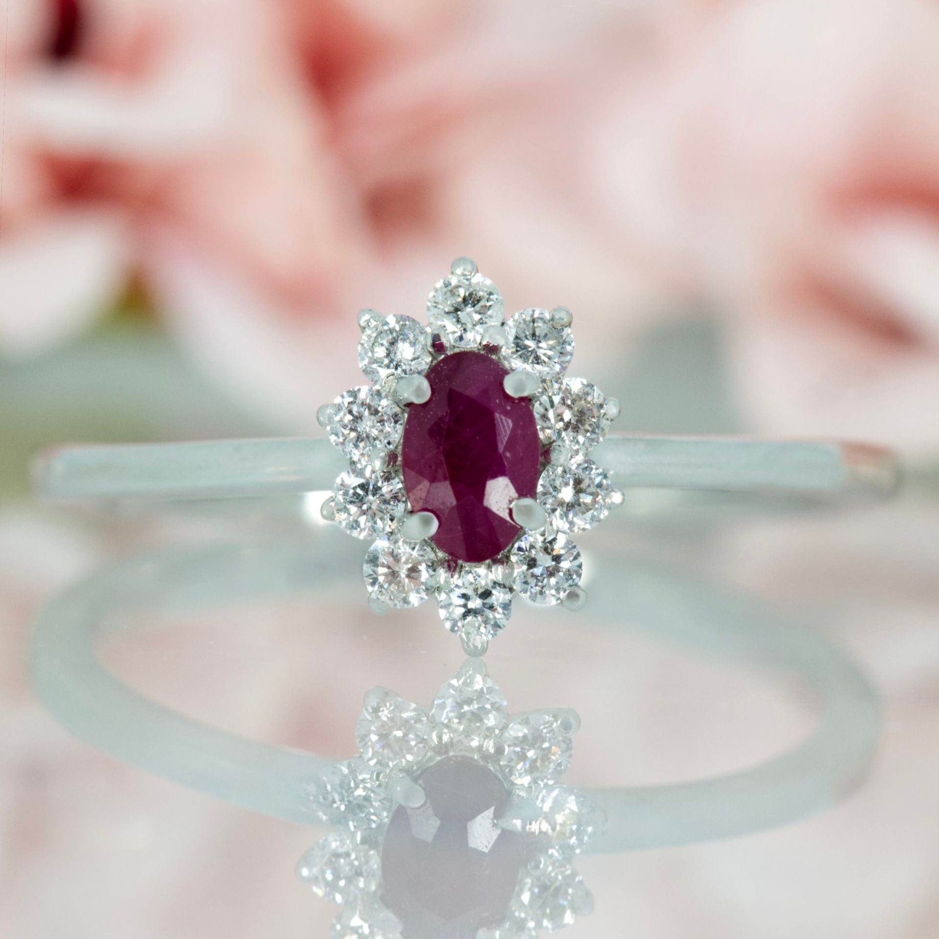 Platinum Oval Cut Ruby & Round Brilliant Cut Diamond Cluster Ring