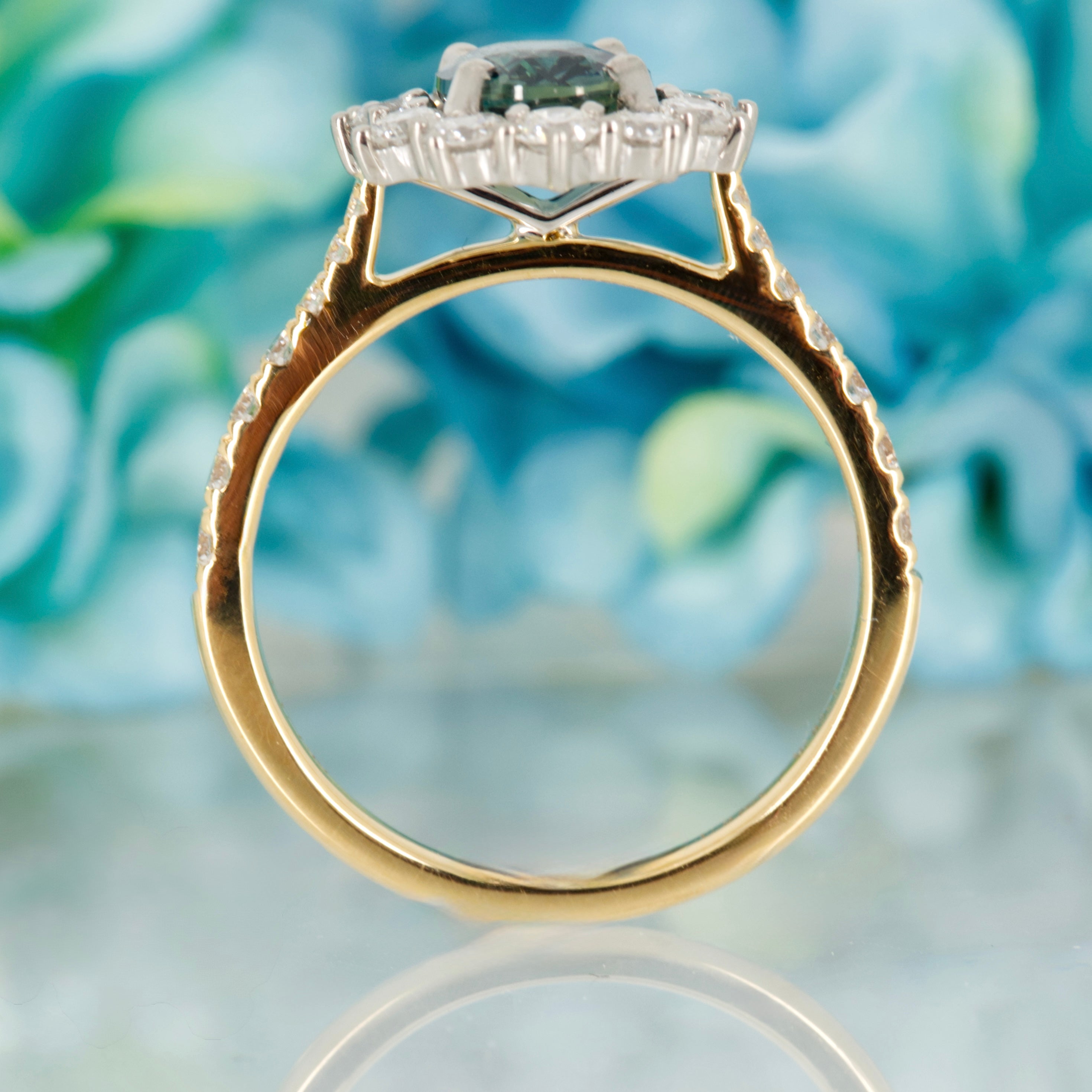 18ct Yellow Gold & Platinum Oval Cut Teal Sapphire & Round Brilliant Cut Diamond Cluster Ring