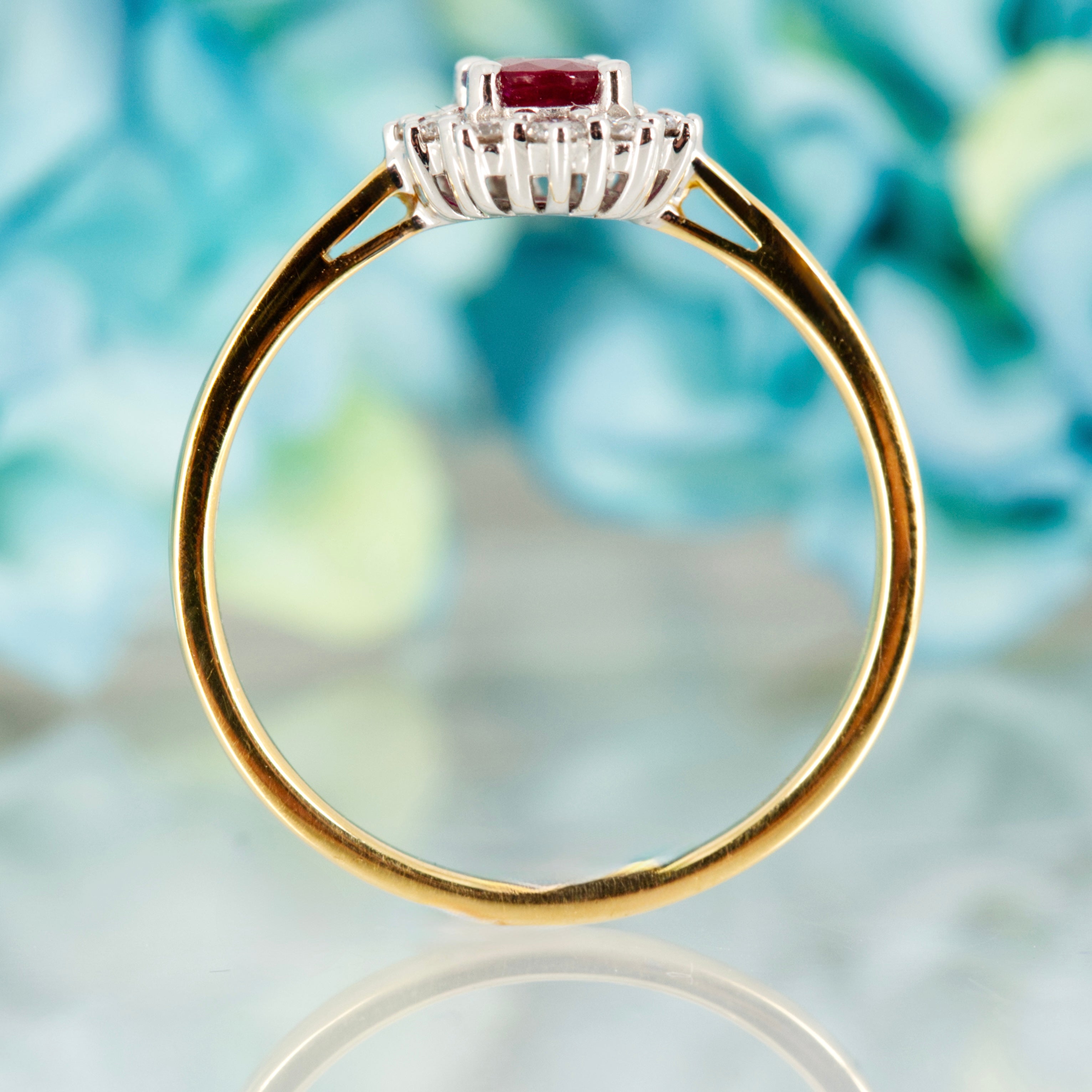 18ct Yellow Gold Oval Cut Ruby & Round Brilliant Cut Diamond Cluster Ring