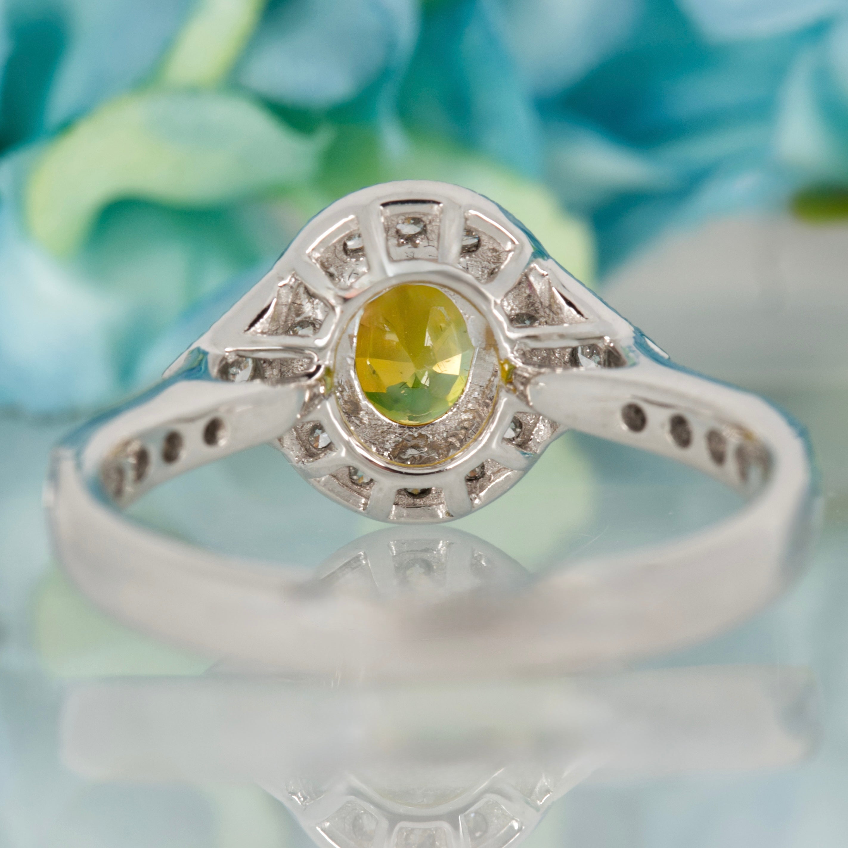 Platinum Oval Cut Yellow Sapphire & Round Brilliant Cut Diamond Halo Cluster Ring