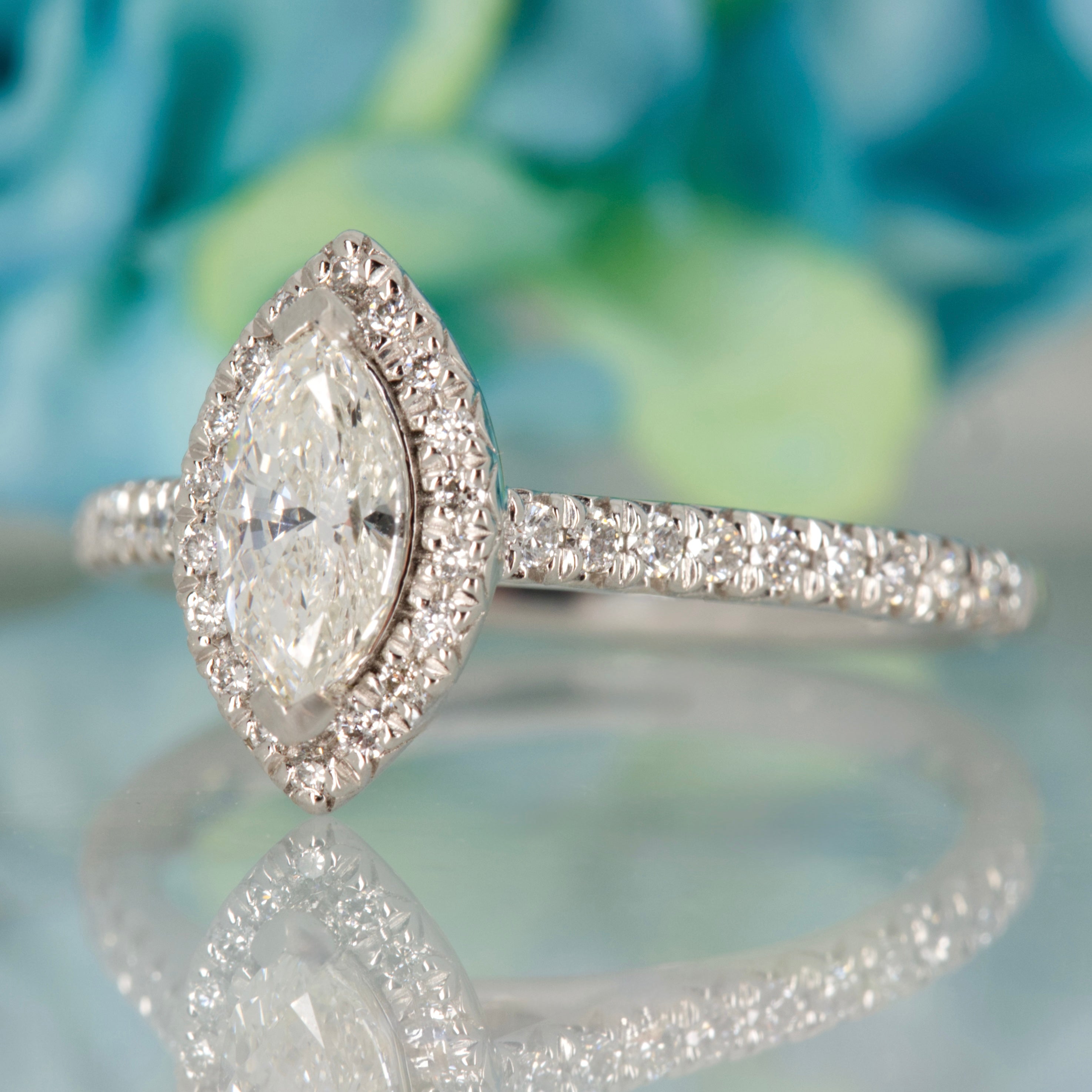 Platinum GIA Certified Marquise Cut Diamond & Round Brilliant Cut Diamond Halo Cluster Ring