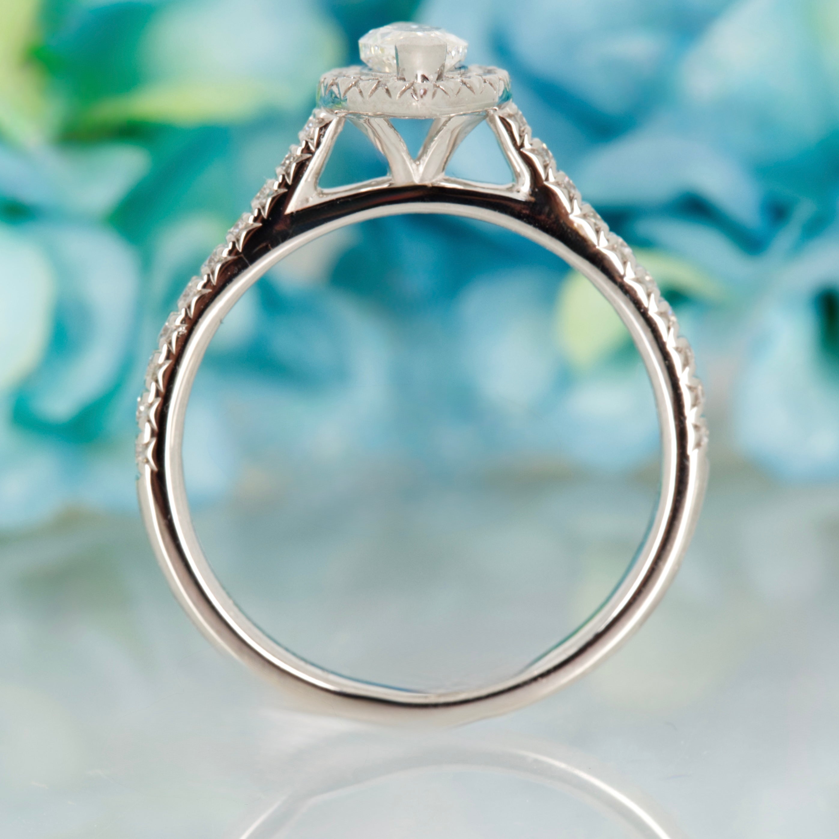 Platinum GIA Certified Marquise Cut Diamond & Round Brilliant Cut Diamond Halo Cluster Ring