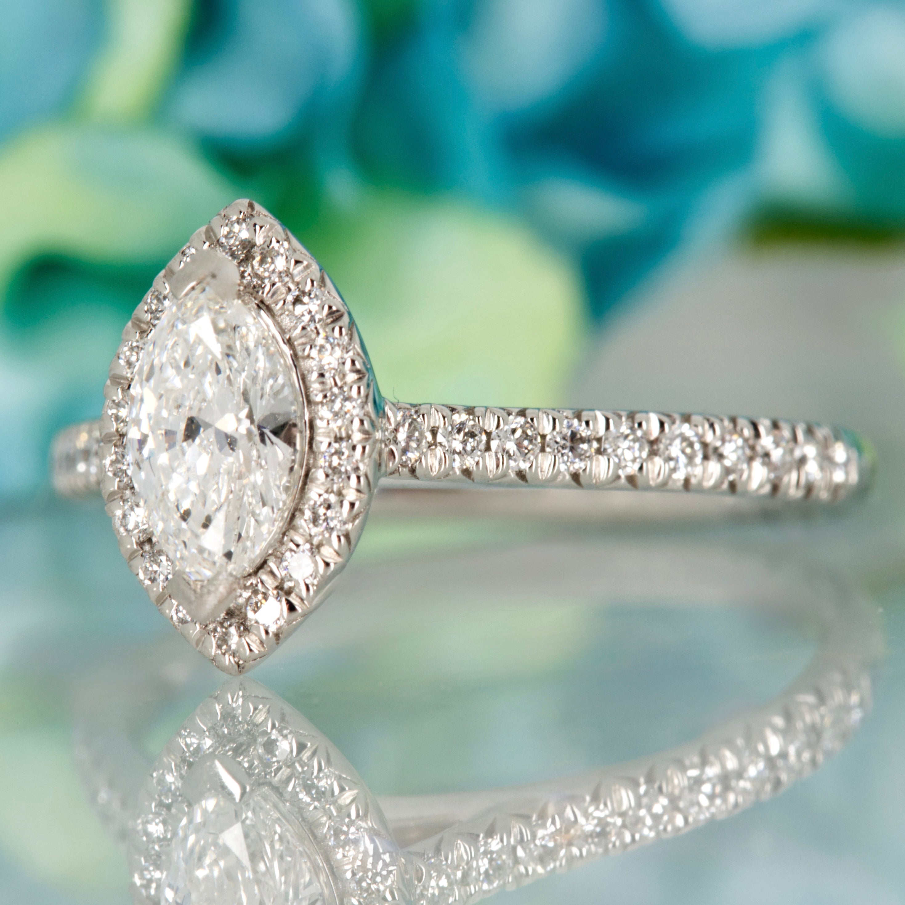 Platinum GIA Certified Marquise Cut Diamond & Round Brilliant Cut Diamond Halo Cluster Ring