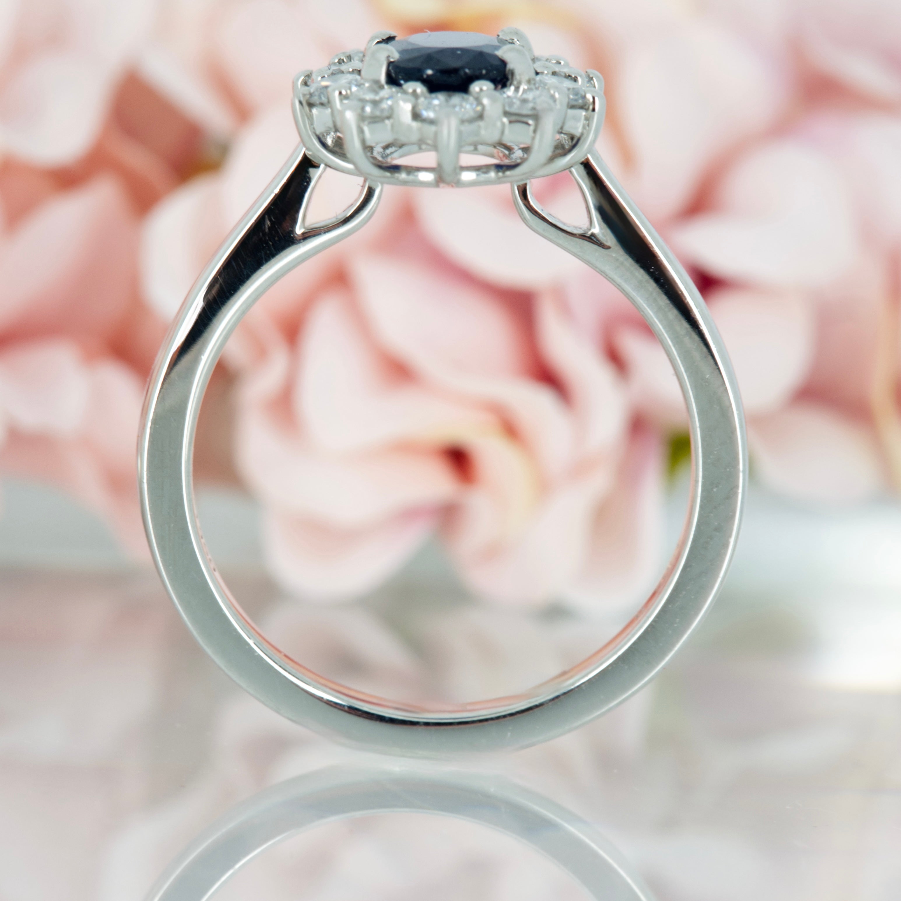 Platinum Oval Cut Sapphire & Round Brilliant Cut Diamond Cluster Ring