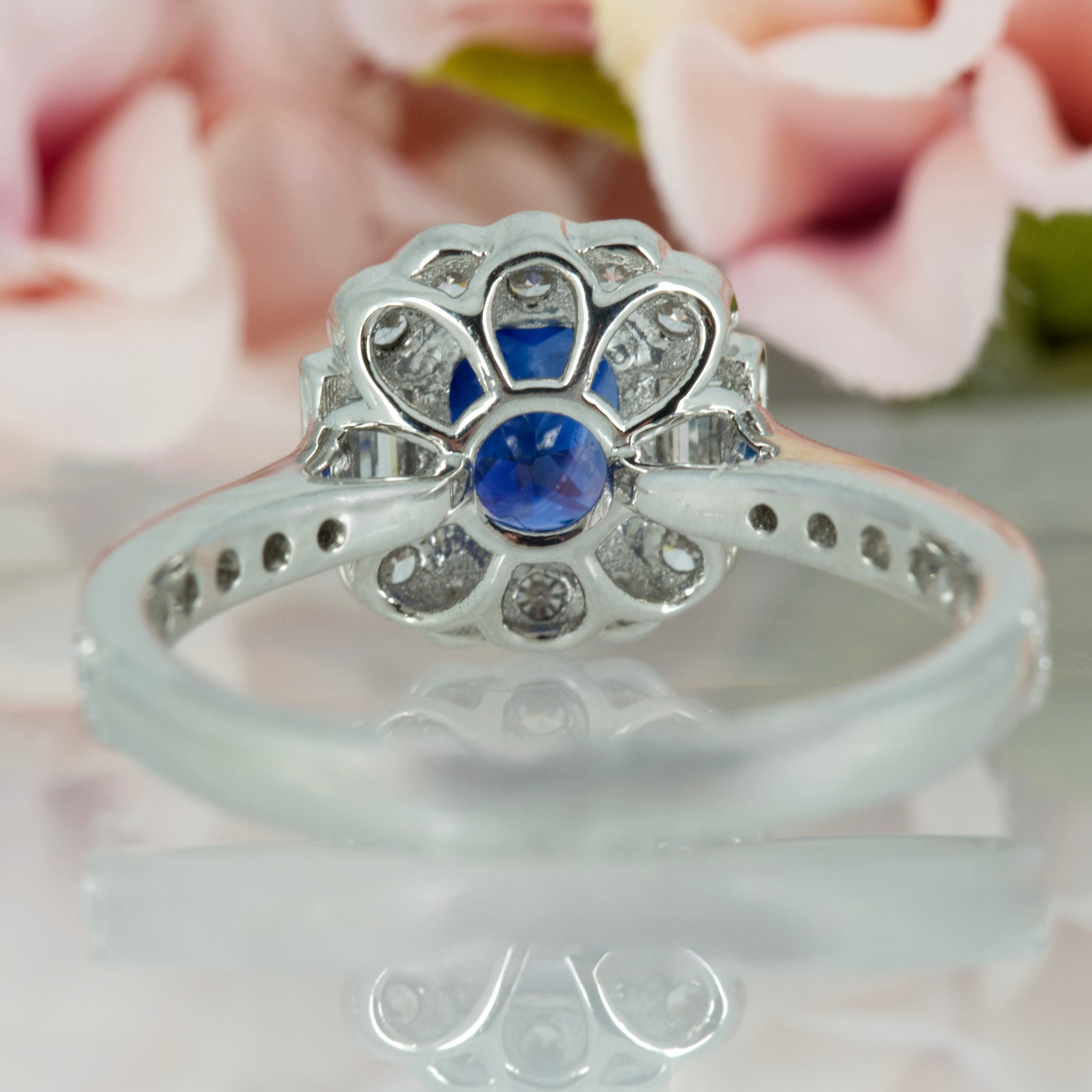 Platinum Octagonal Cut Sapphire & Baguette and Round Brilliant Cut Diamond Cluster Ring