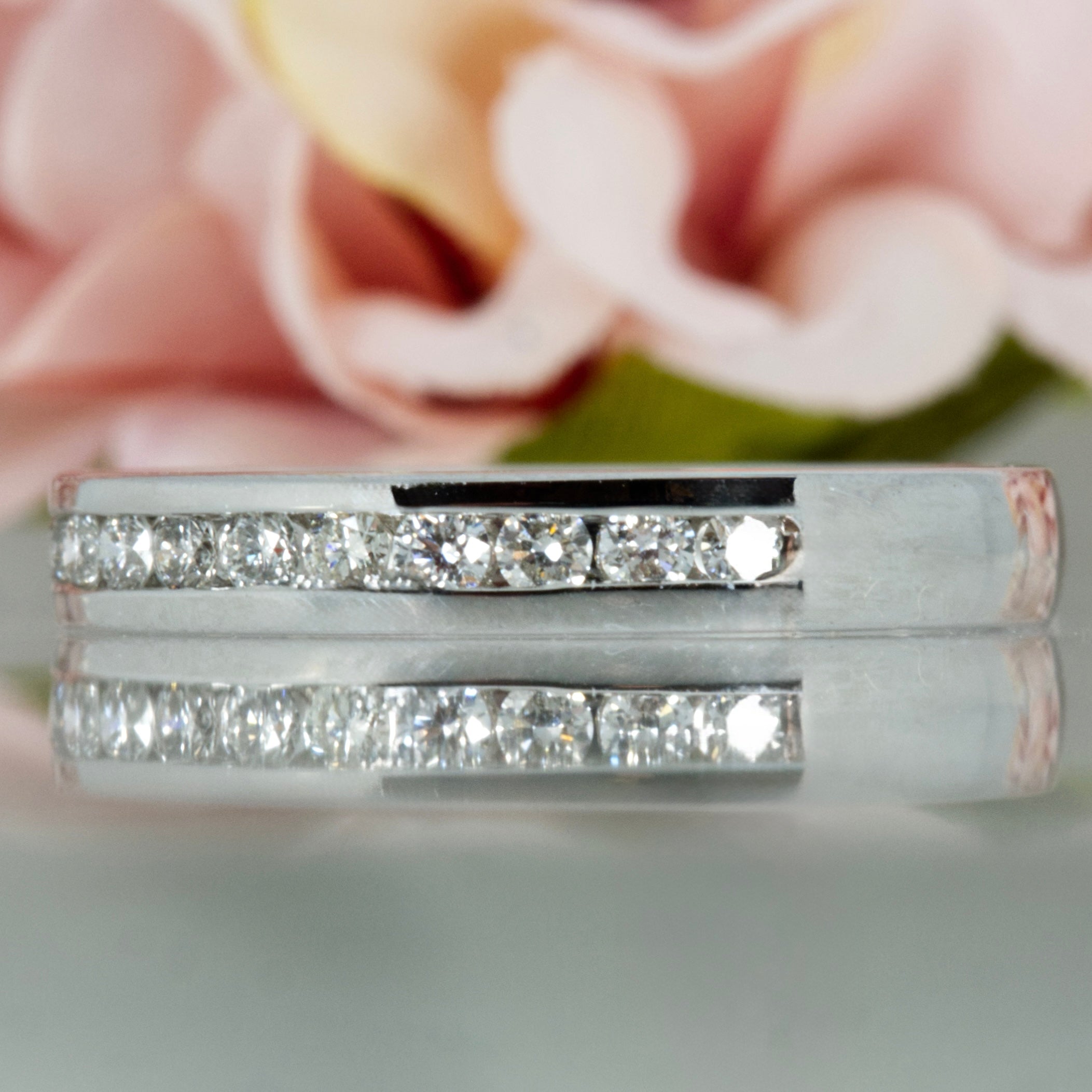 Platinum 0.25ct Round Brilliant Cut Diamond Channel Set Half Eternity Ring