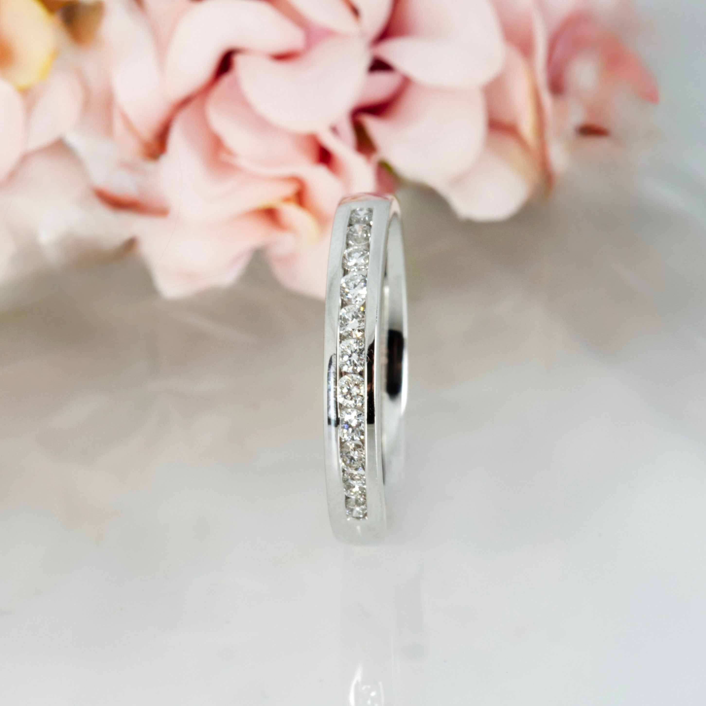 Platinum 0.25ct Round Brilliant Cut Diamond Channel Set Half Eternity Ring