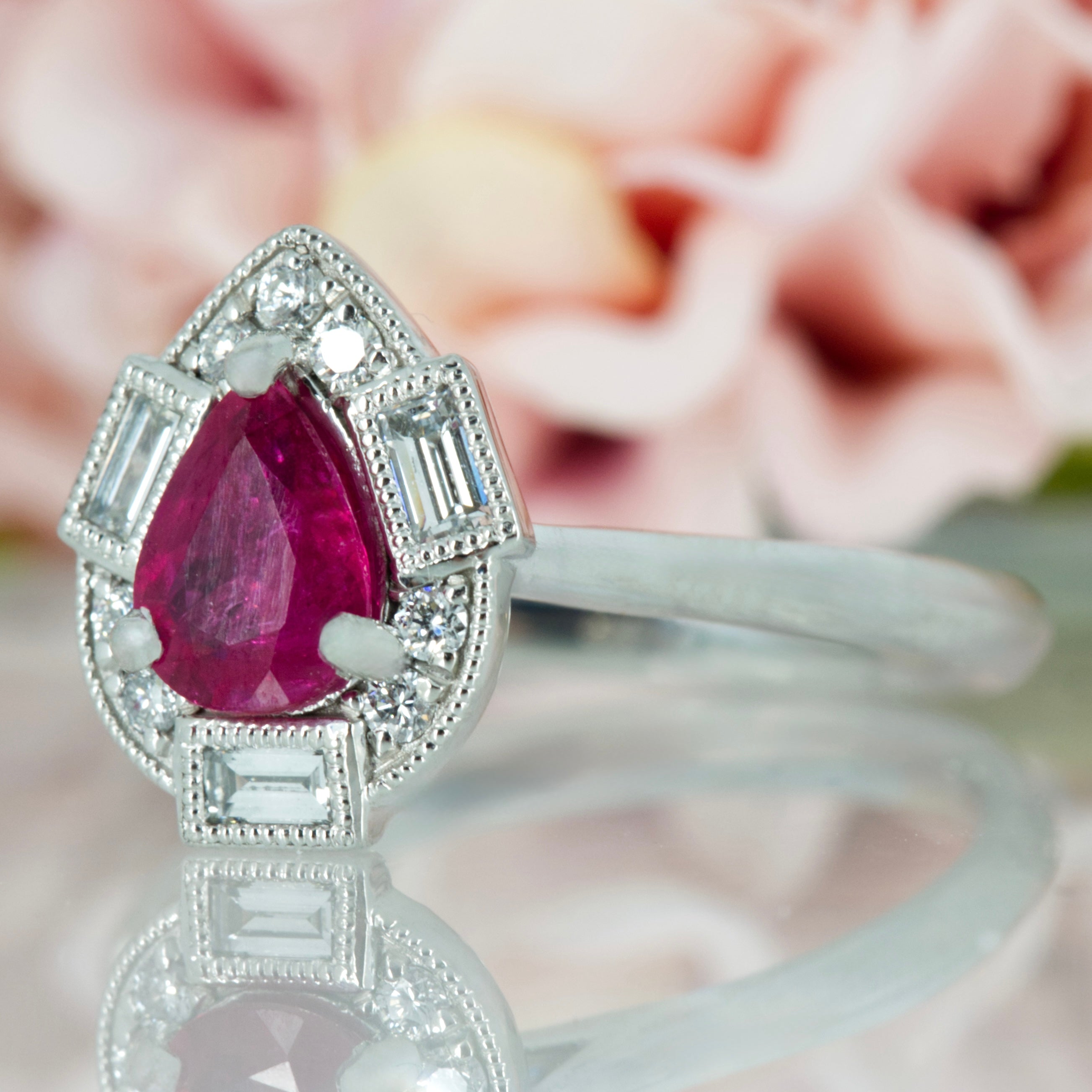 Platinum Pear Cut Ruby & Baguette and Round Brilliant Cut Diamond Cluster Ring