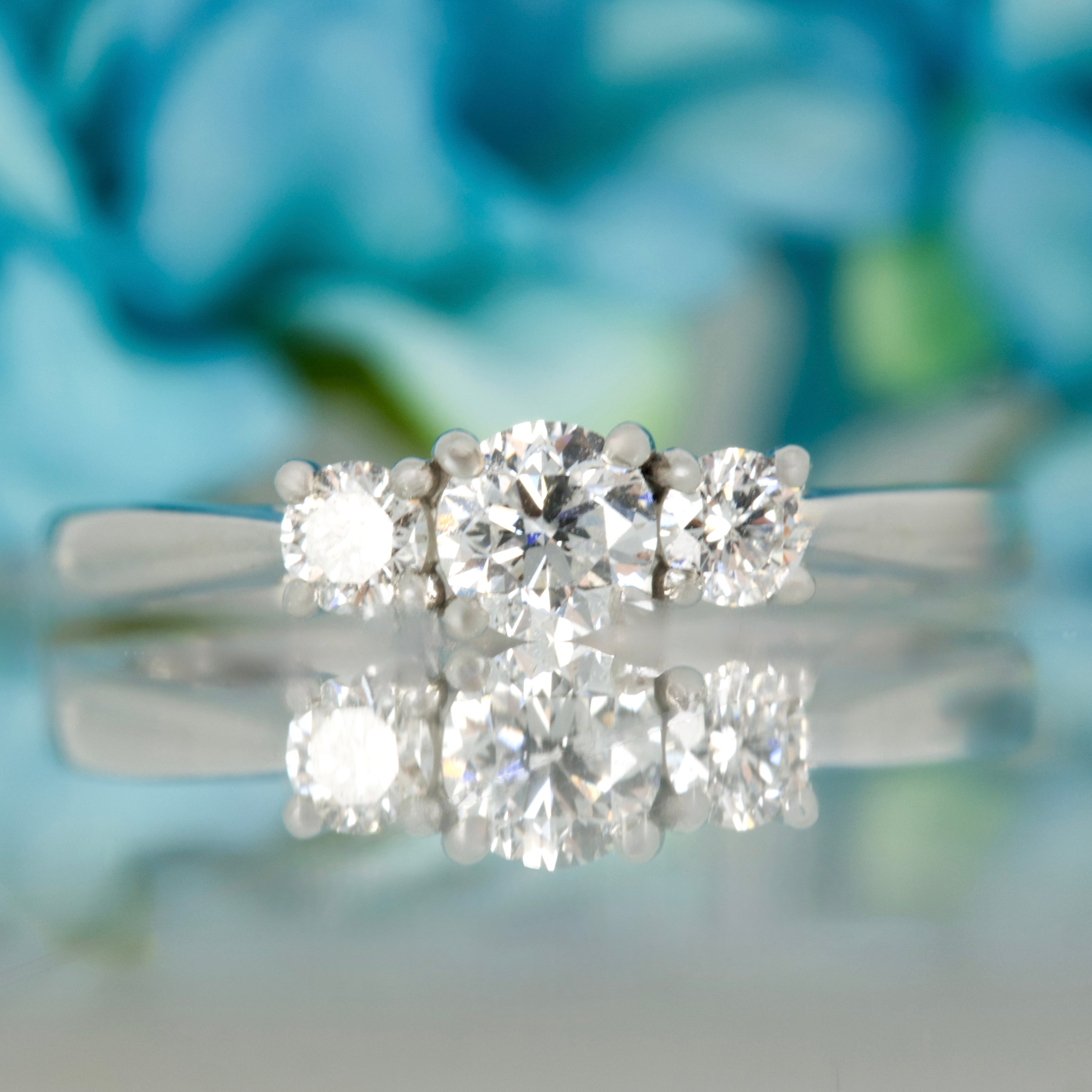 Platinum 0.50ct Round Brilliant Cut Diamond Claw Set Trilogy Ring