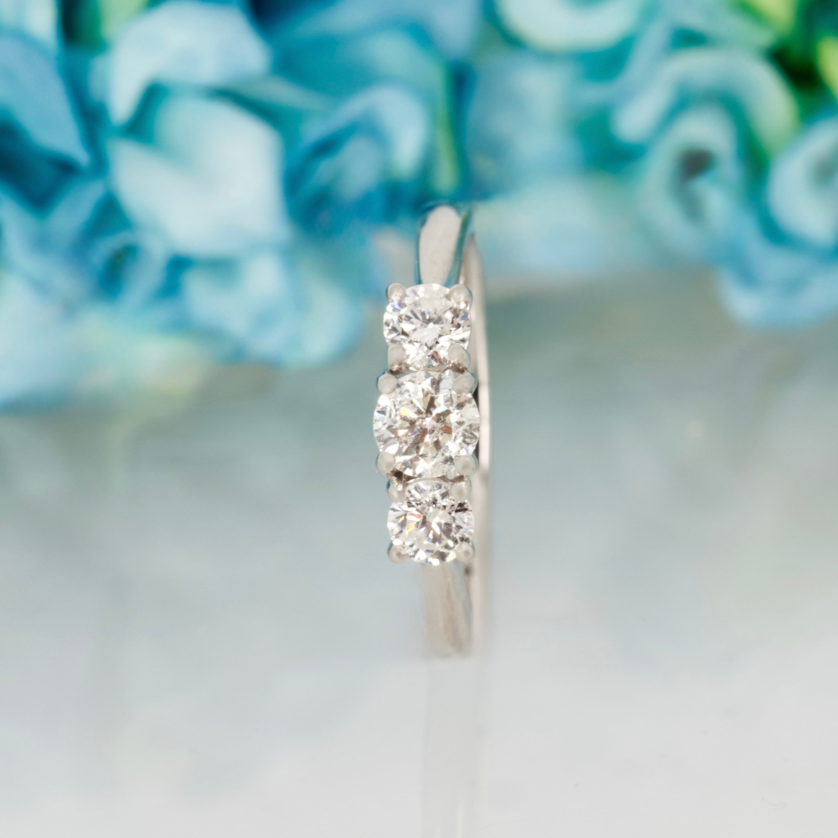 Platinum 0.50ct Round Brilliant Cut Diamond Claw Set Trilogy Ring