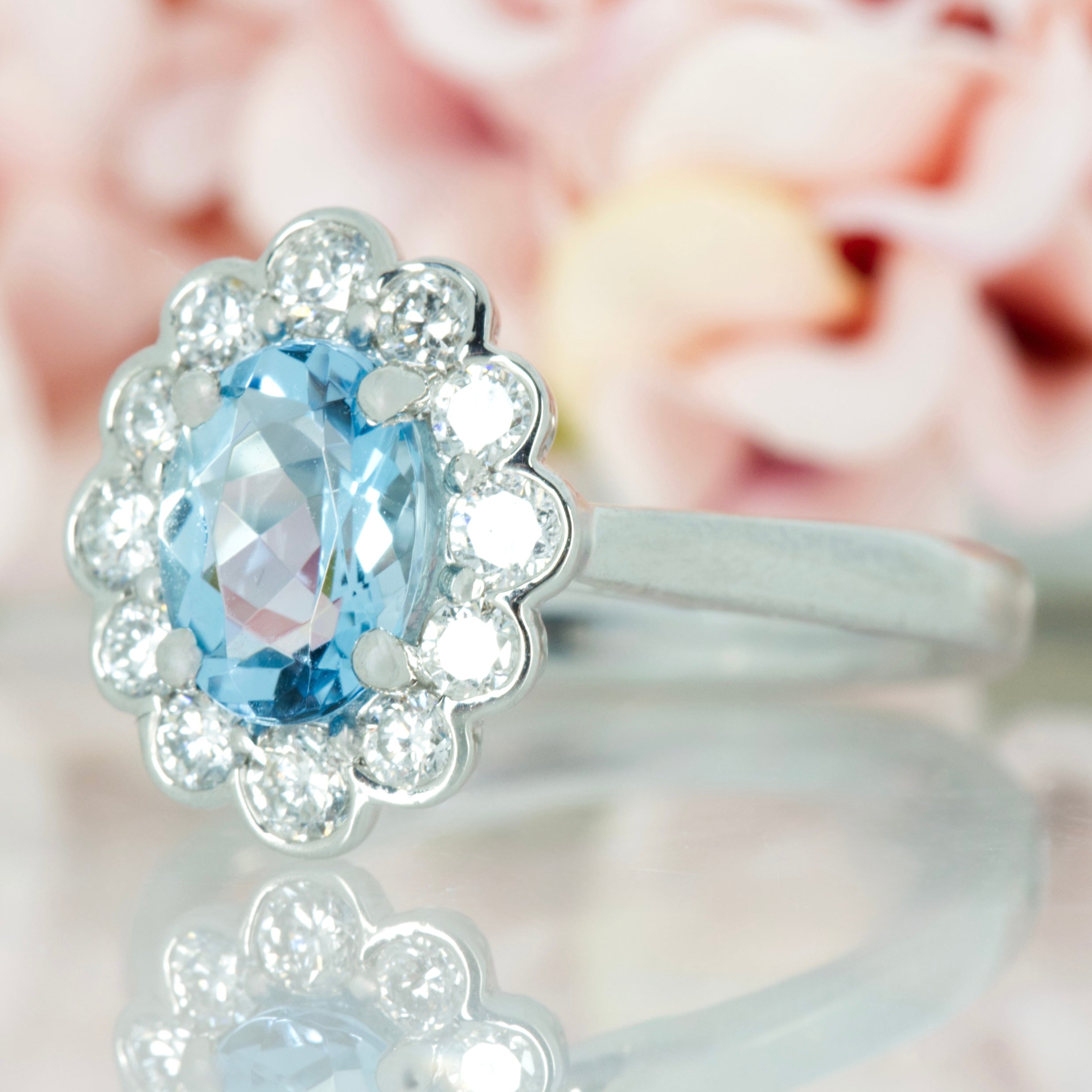 Platinum Oval Cut Aquamarine & Round Brilliant Cut Diamond Cluster Ring