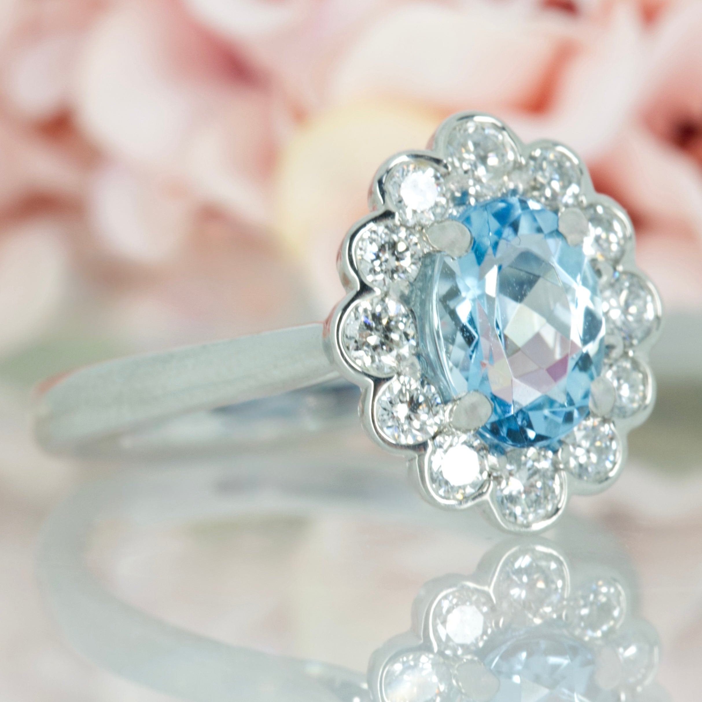 Platinum Oval Cut Aquamarine & Round Brilliant Cut Diamond Cluster Ring