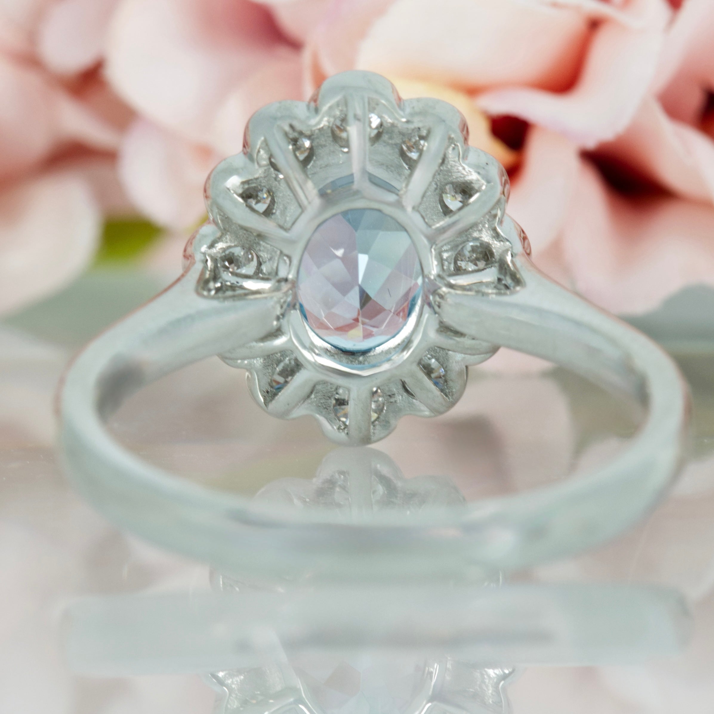 Platinum Oval Cut Aquamarine & Round Brilliant Cut Diamond Cluster Ring