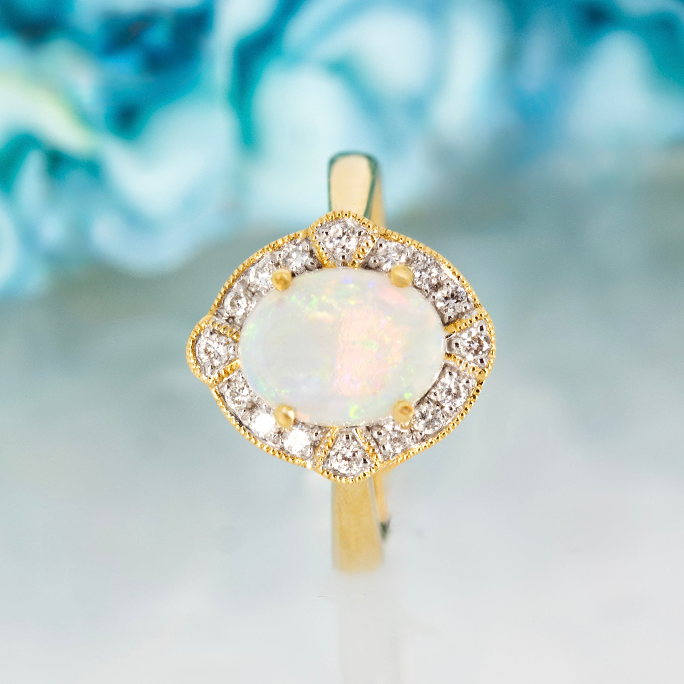18ct Yellow Gold Oval Shaped Opal & Round Brilliant Cut Diamond Cluster Ring