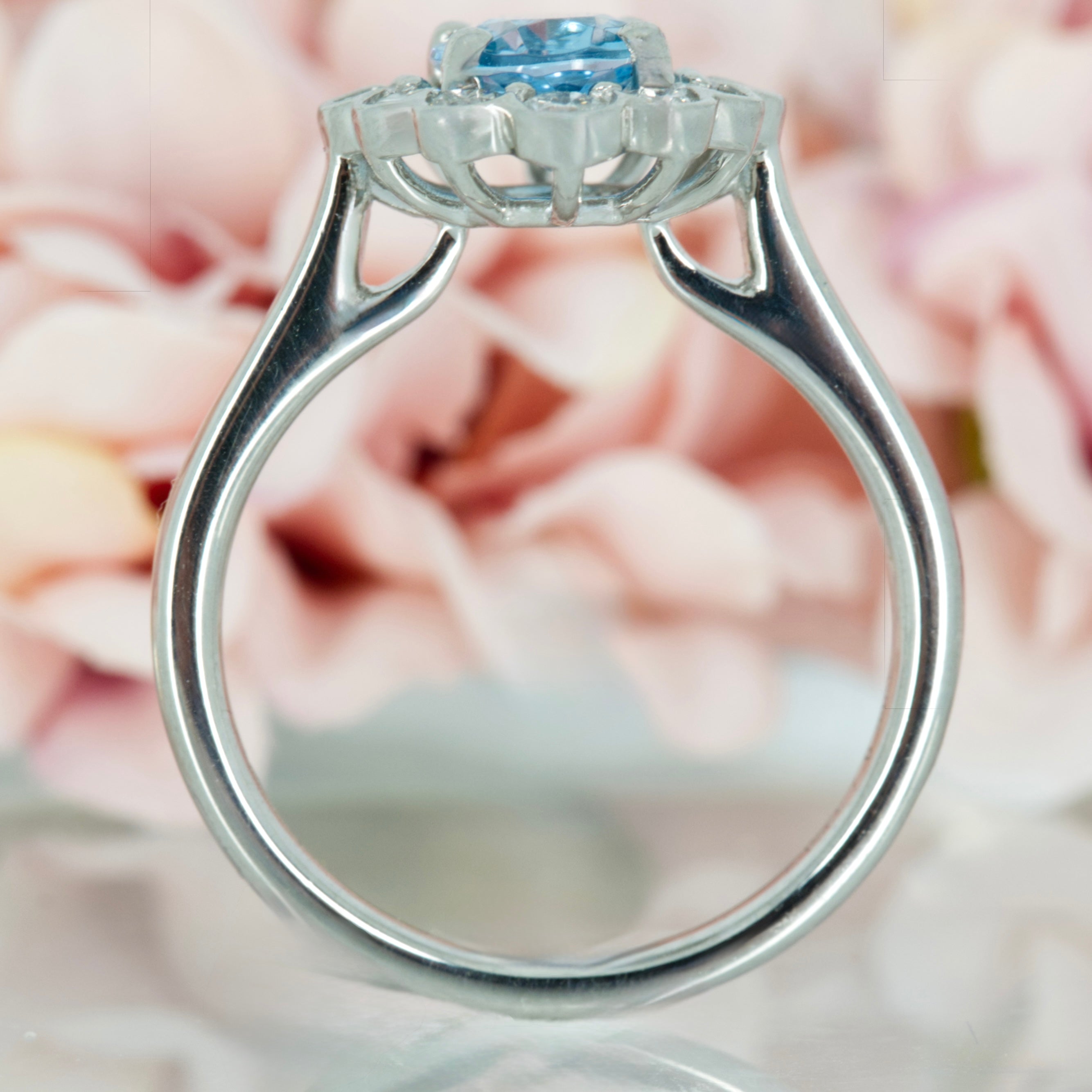 Platinum Oval Cut Aquamarine & Round Brilliant Cut Diamond Cluster Ring