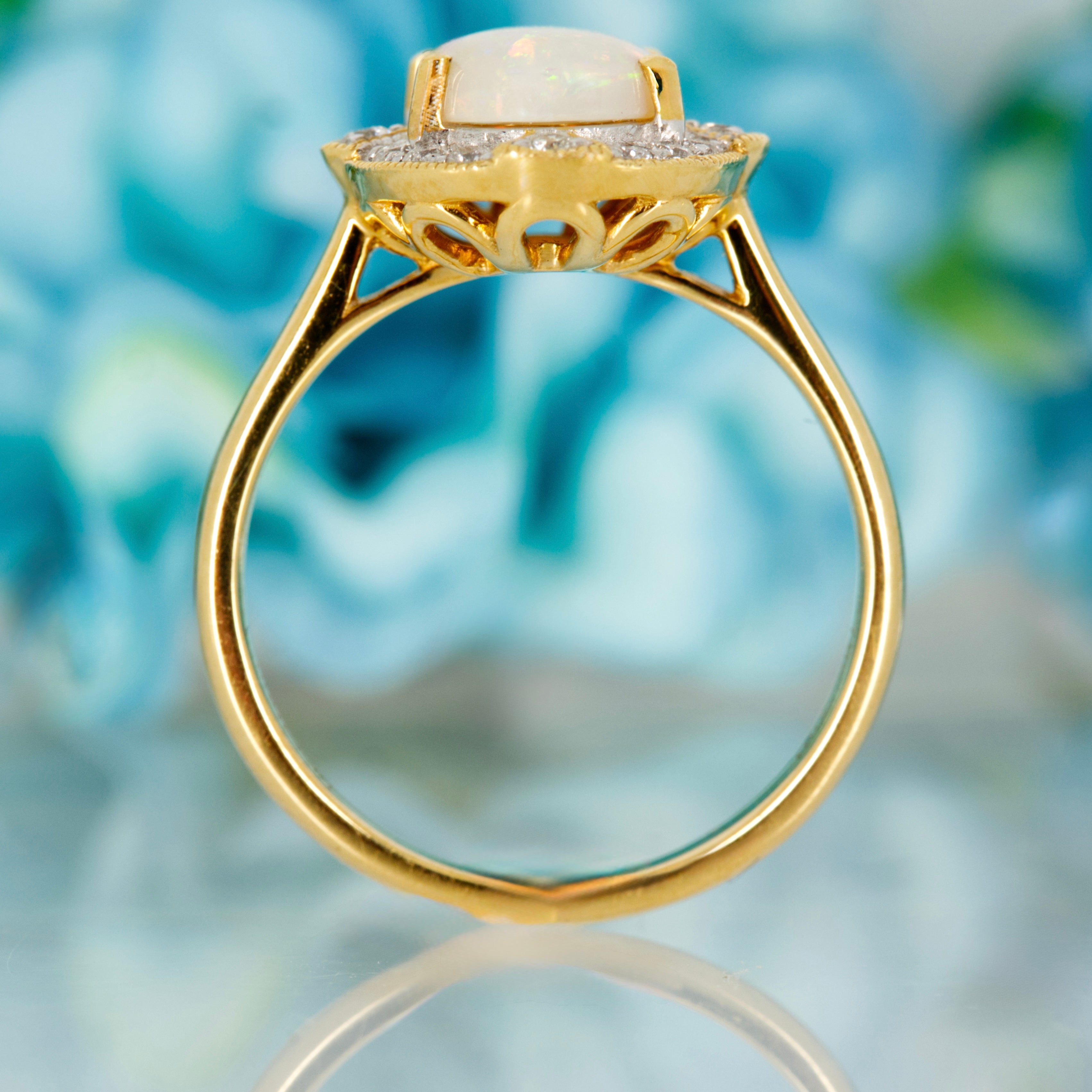 18ct Yellow Gold Oval Shaped Opal & Round Brilliant Cut Diamond Cluster Ring