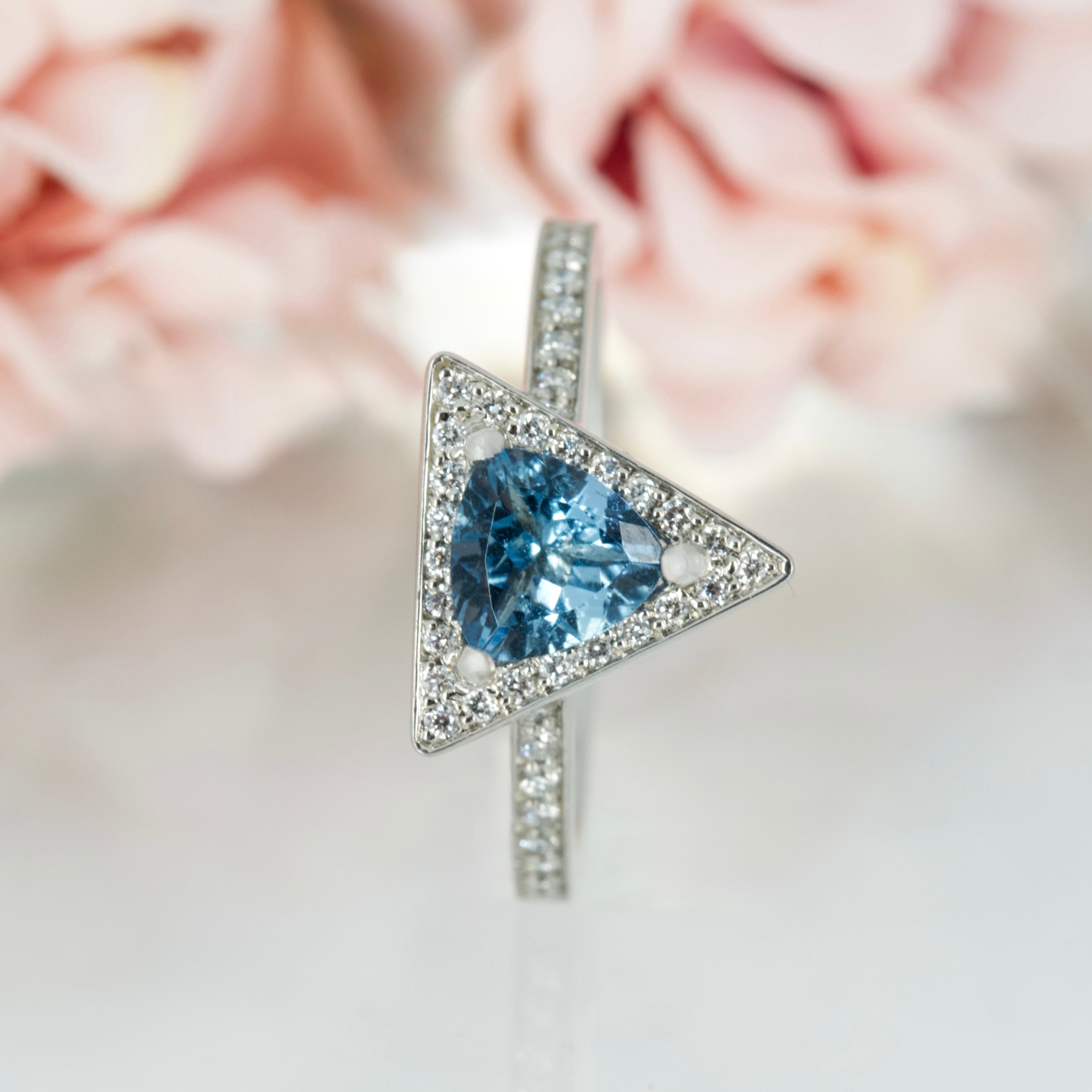 Platinum Trilliant Cut Aquamarine & Round Brilliant Cut Diamond Halo Cluster Ring