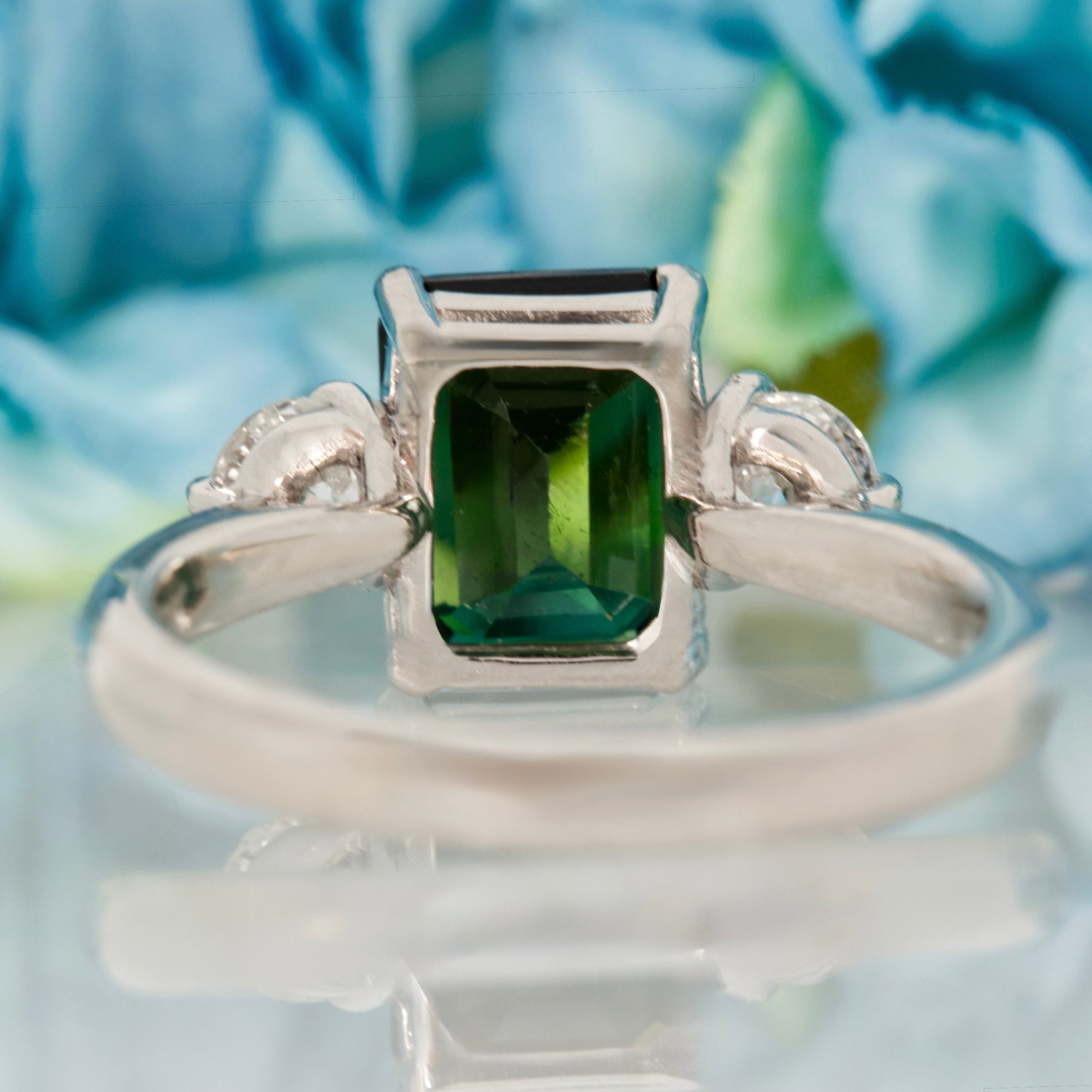 Platinum Octagonal Cut Green Tourmaline & Round Brilliant Cut Diamond Trilogy Ring