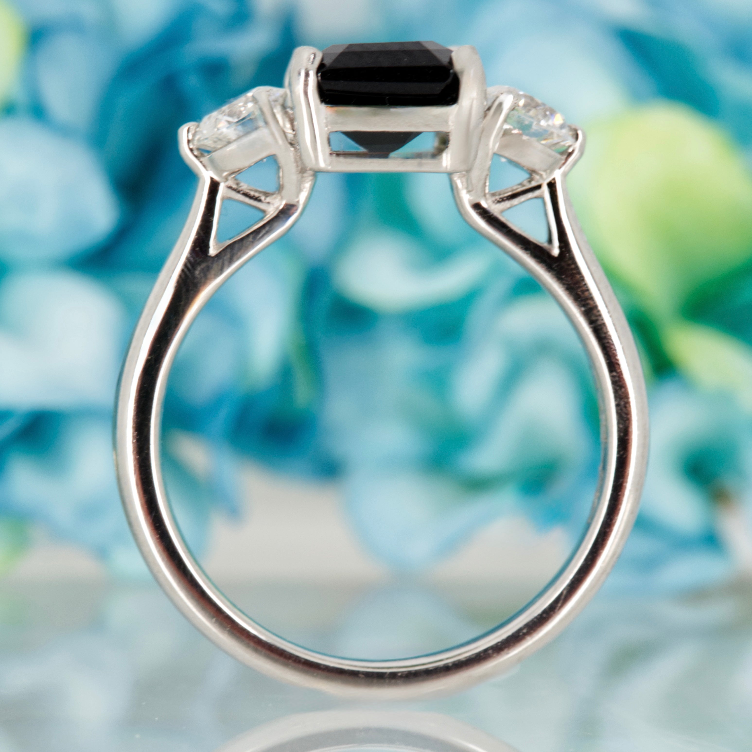 Platinum Octagonal Cut Green Tourmaline & Round Brilliant Cut Diamond Trilogy Ring