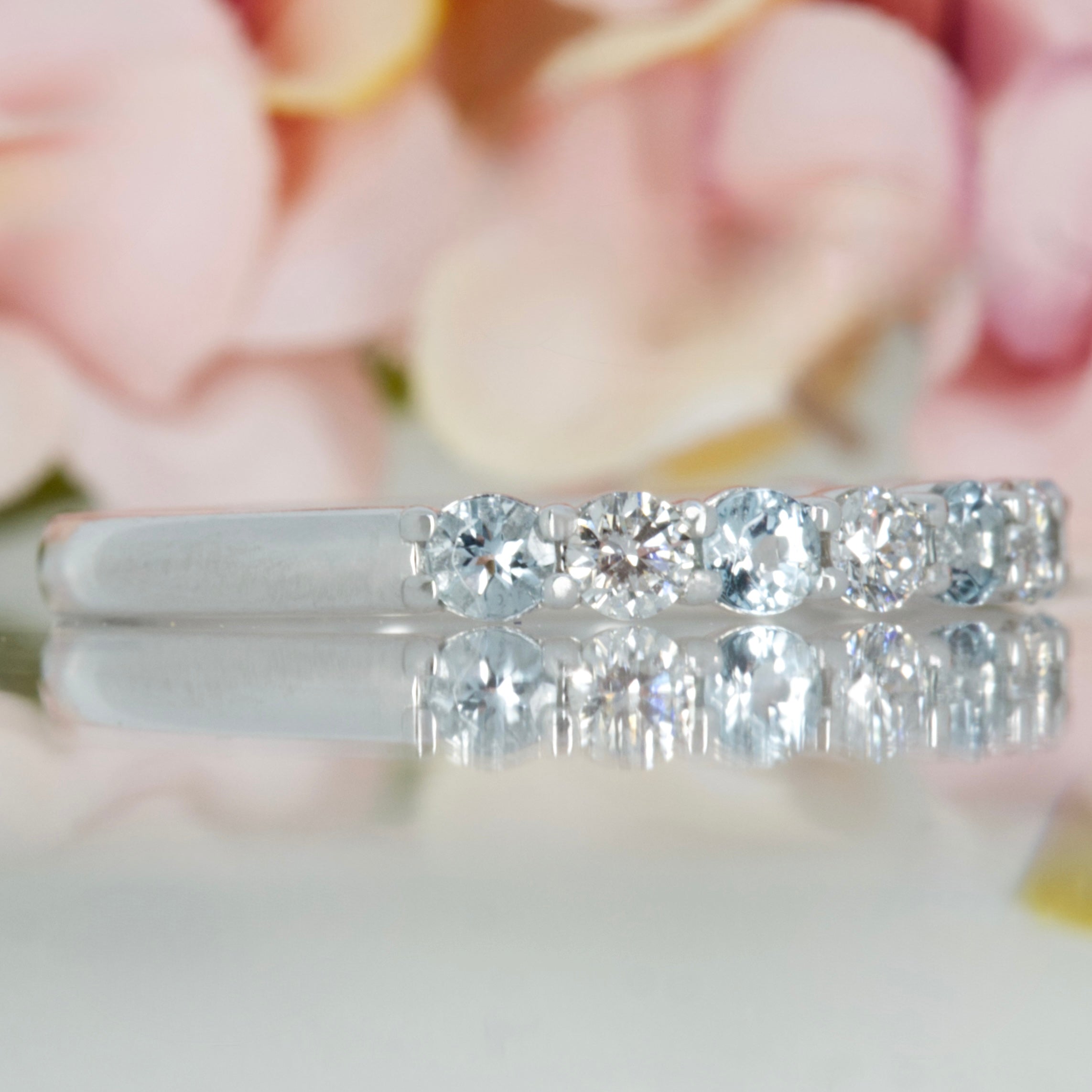 Platinum Round Cut Aquamarine & Round Brilliant Cut Diamond Claw Set Half Eternity Ring
