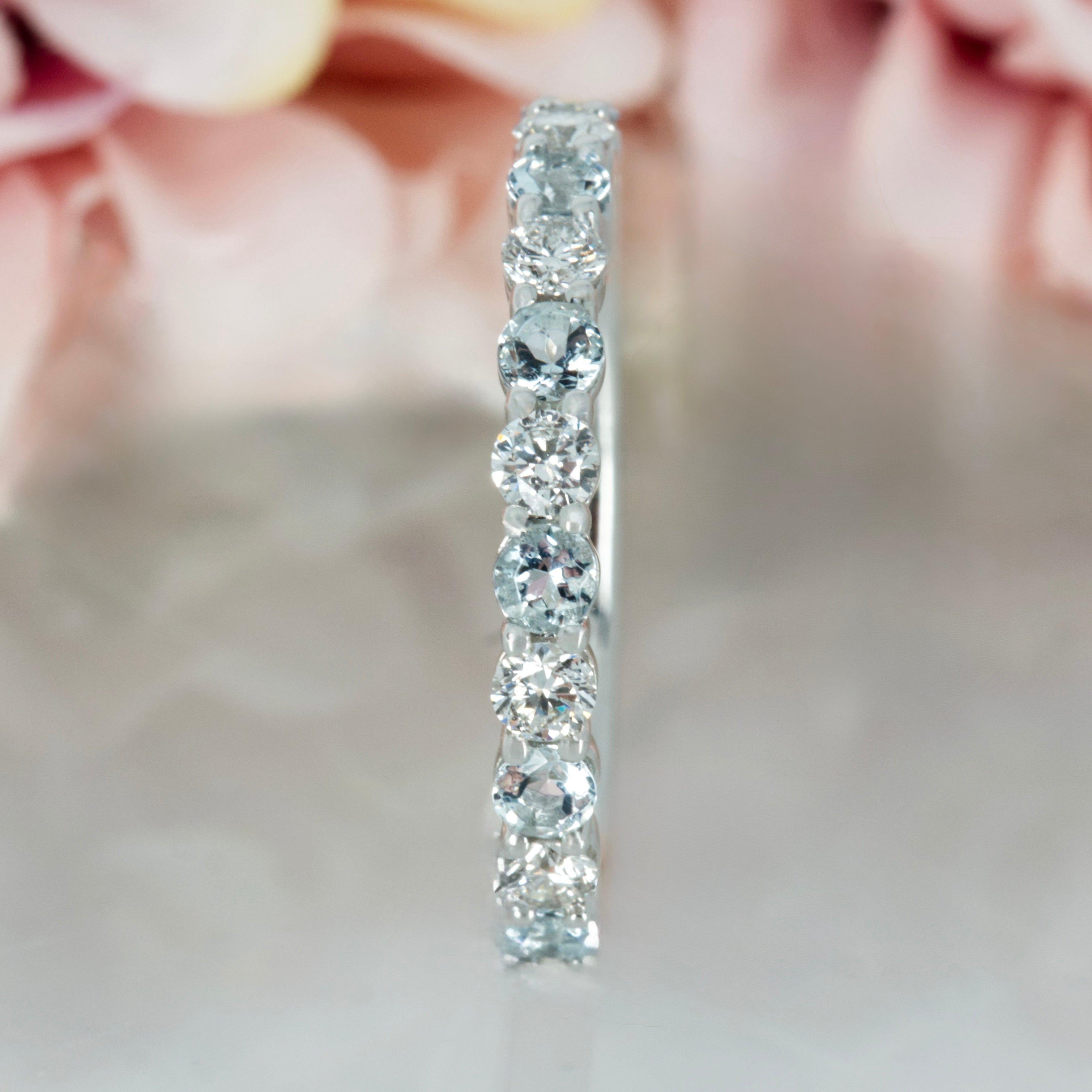 Platinum Round Cut Aquamarine & Round Brilliant Cut Diamond Claw Set Half Eternity Ring