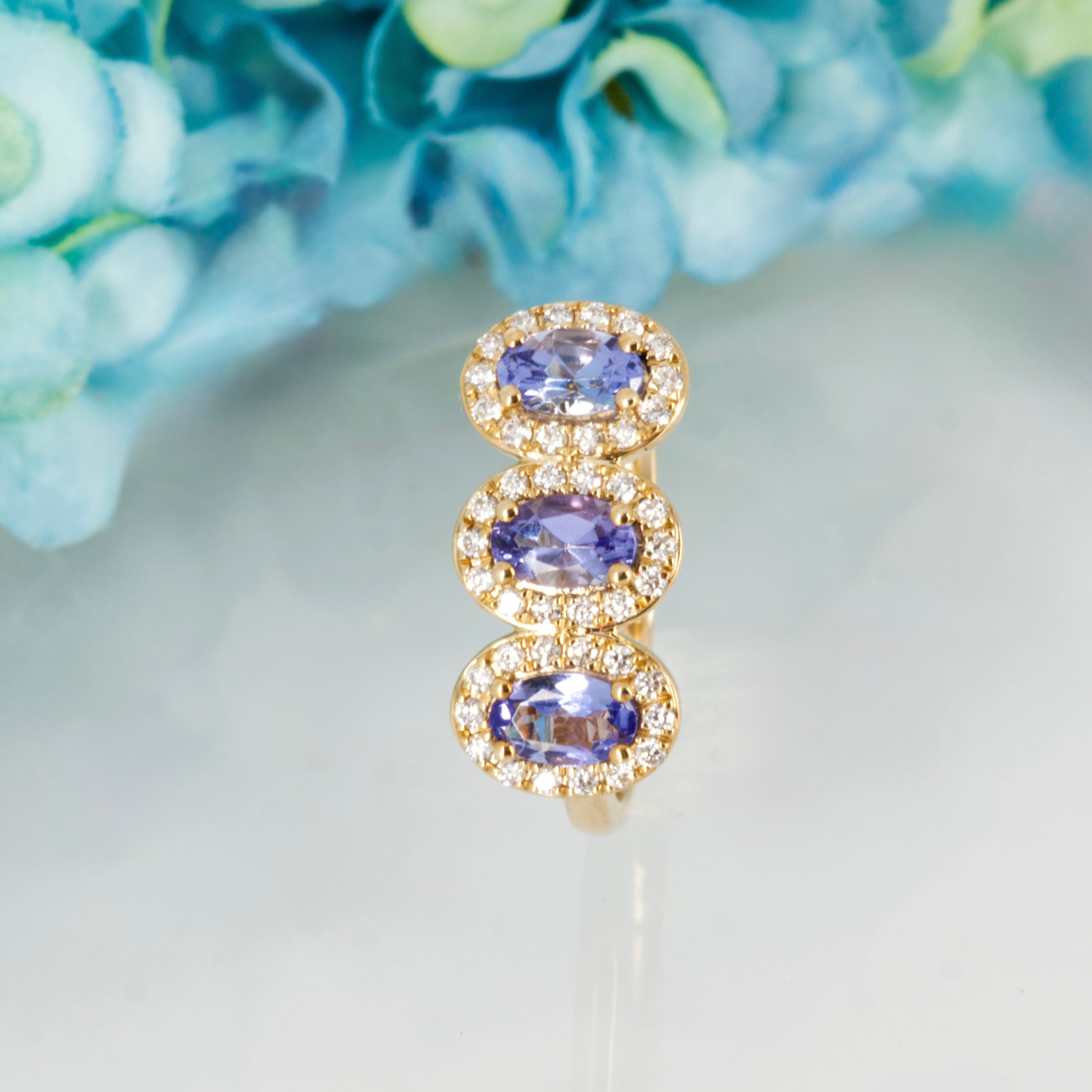9ct Yellow Gold Oval Cut Tanzanite & Round Brilliant Cut Diamond Triple Halo Cluster Ring