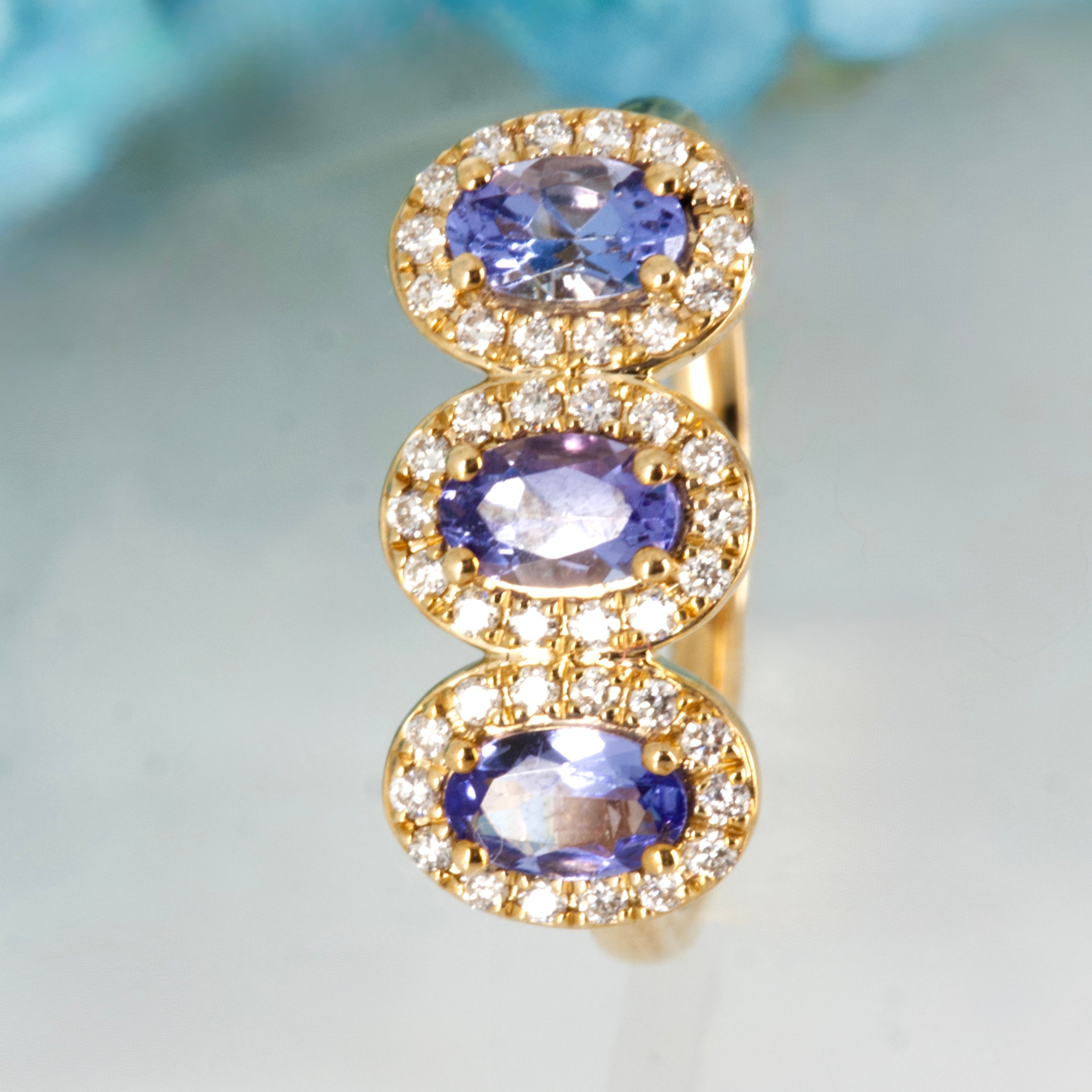 9ct Yellow Gold Oval Cut Tanzanite & Round Brilliant Cut Diamond Triple Halo Cluster Ring