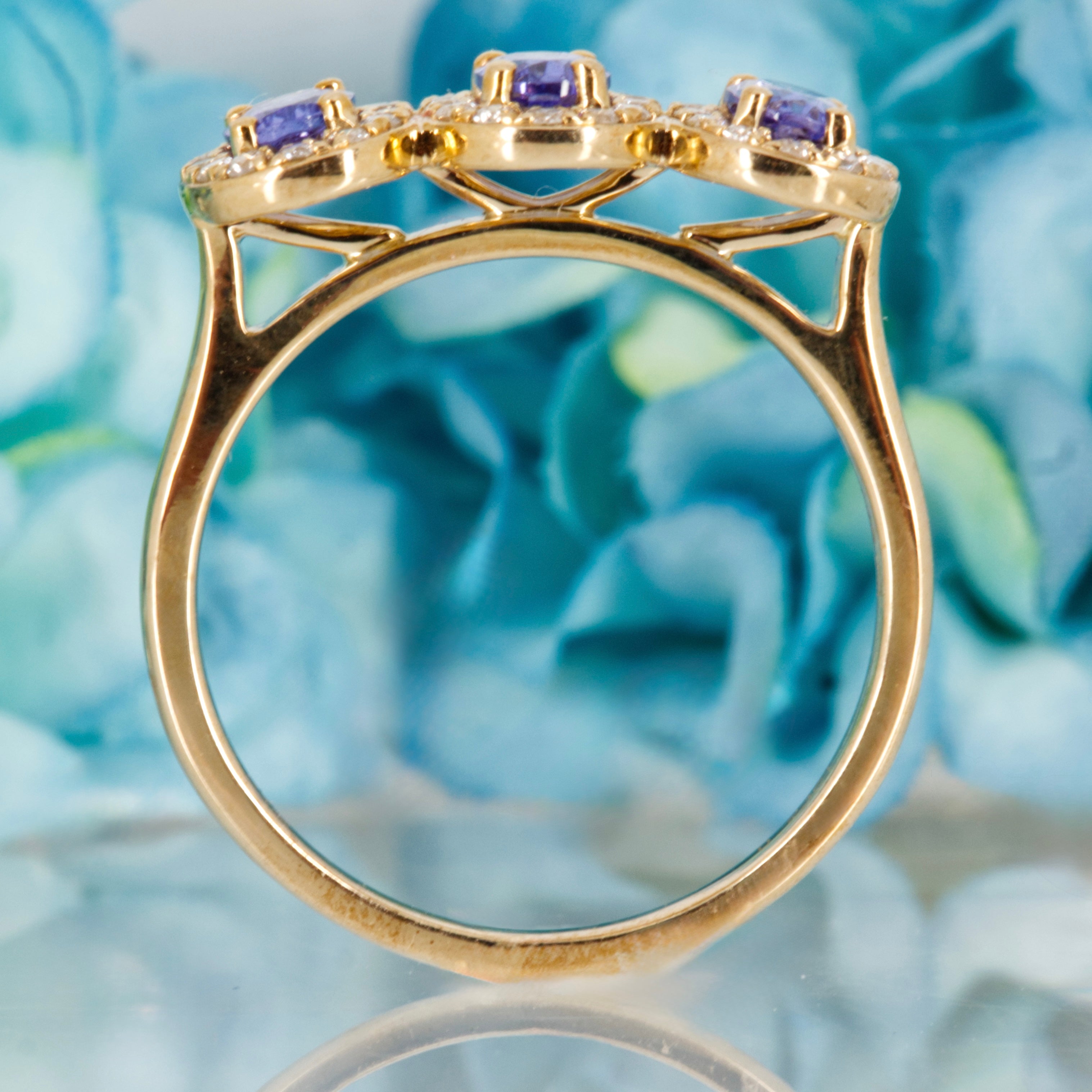 9ct Yellow Gold Oval Cut Tanzanite & Round Brilliant Cut Diamond Triple Halo Cluster Ring