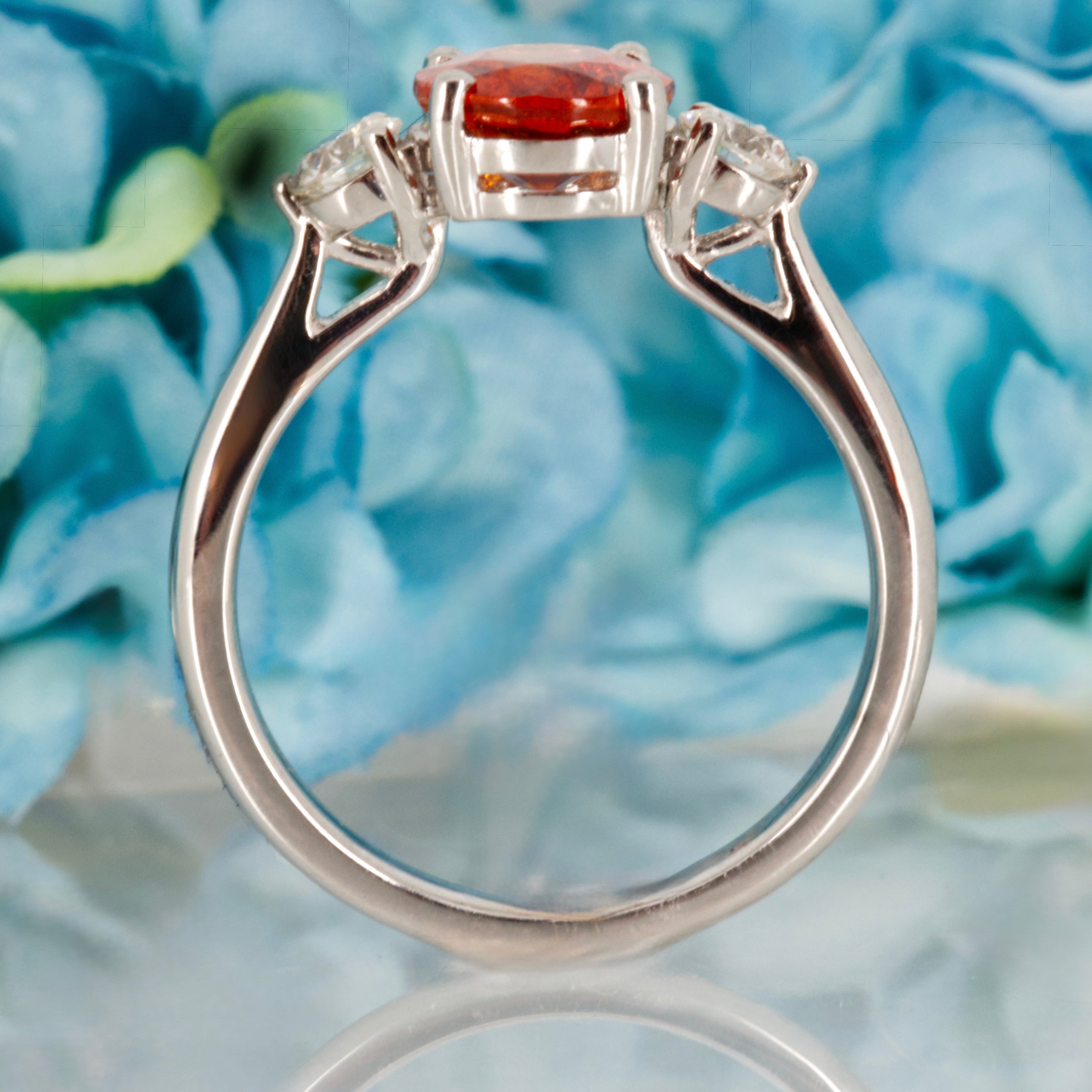 Platinum Oval Cut Mandarin Garnet & Round Brilliant Cut Diamond Trilogy Ring