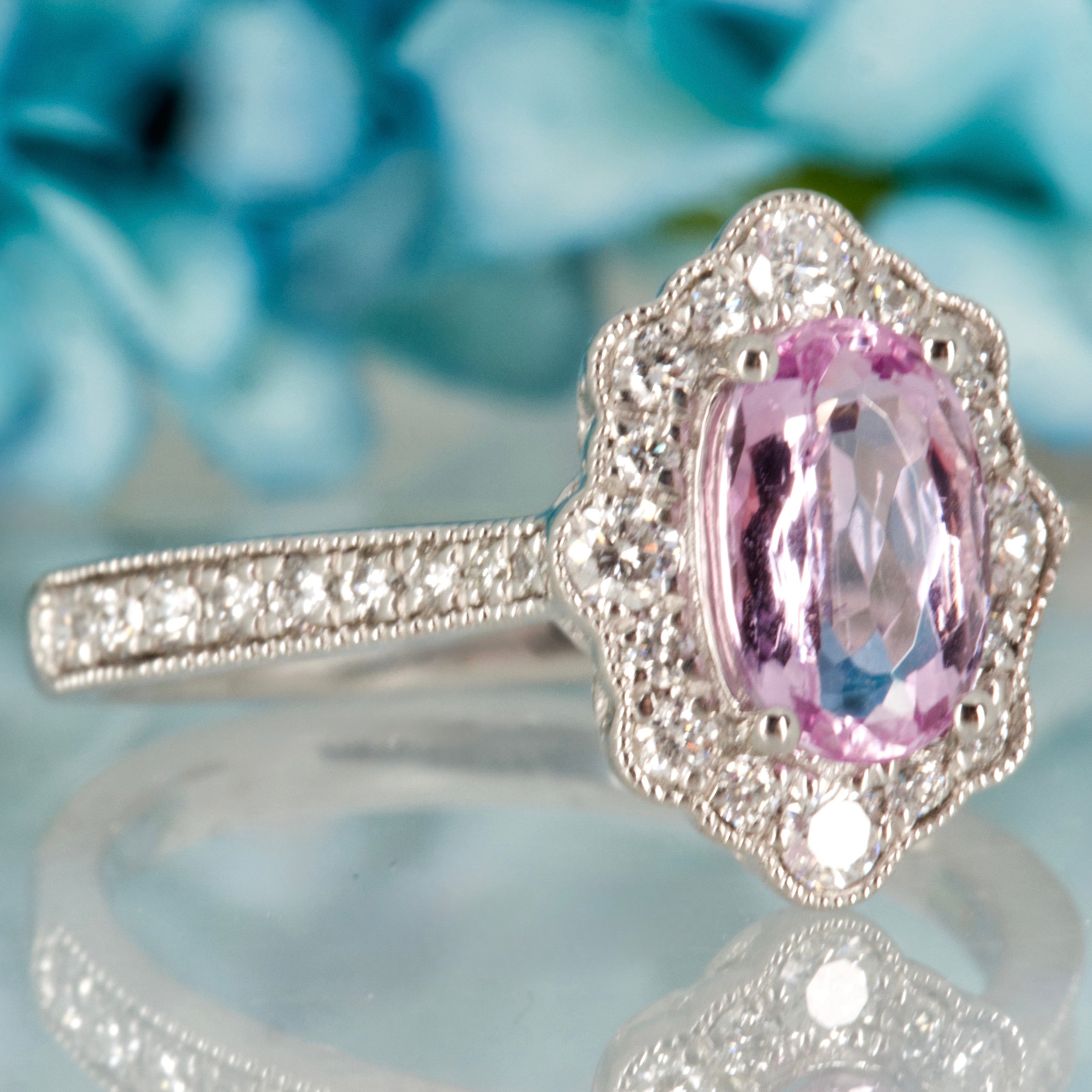 Platinum Oval Cut Pink Topaz & Round Brilliant Cut Diamond Cluster Ring
