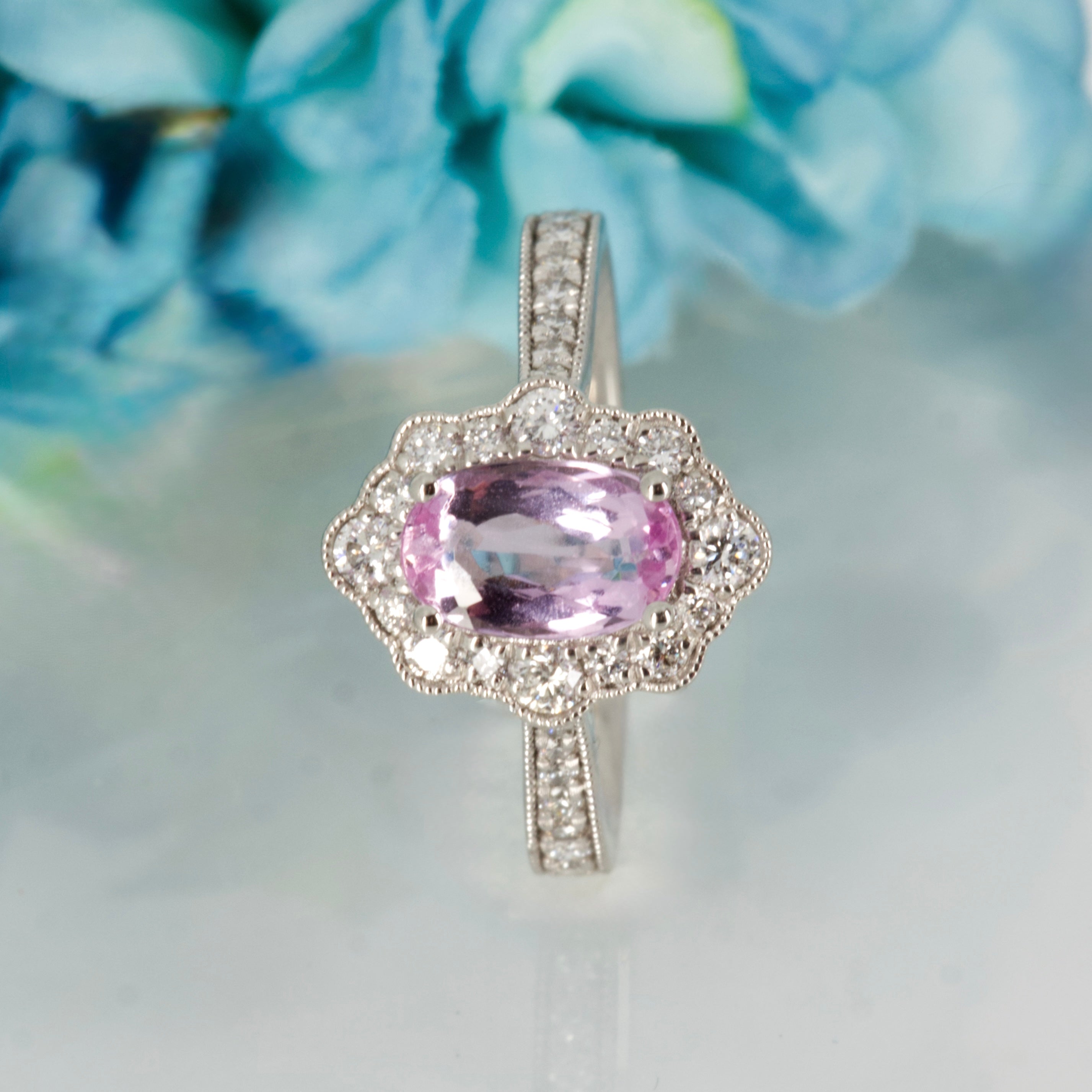 Platinum Oval Cut Pink Topaz & Round Brilliant Cut Diamond Cluster Ring