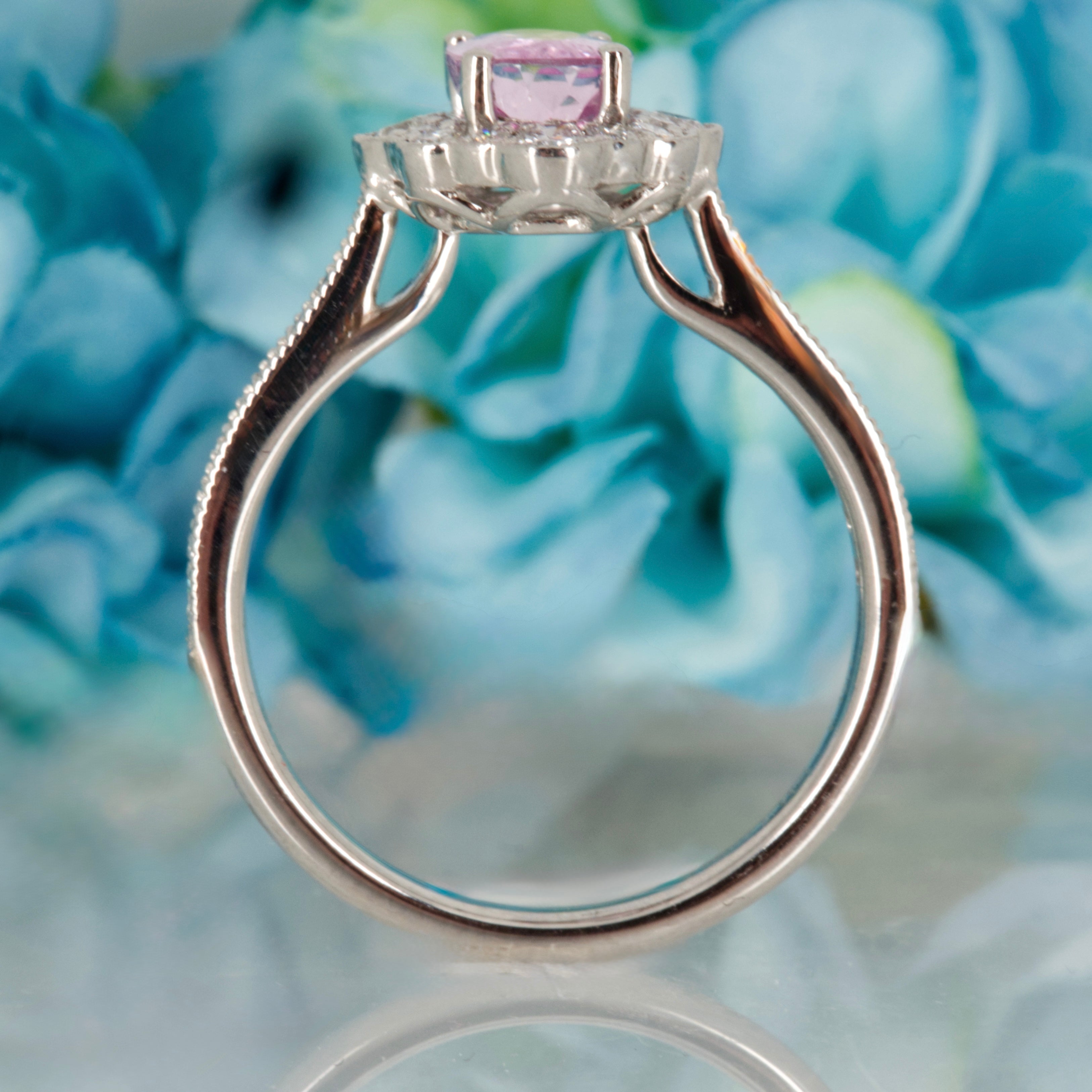 Platinum Oval Cut Pink Topaz & Round Brilliant Cut Diamond Cluster Ring