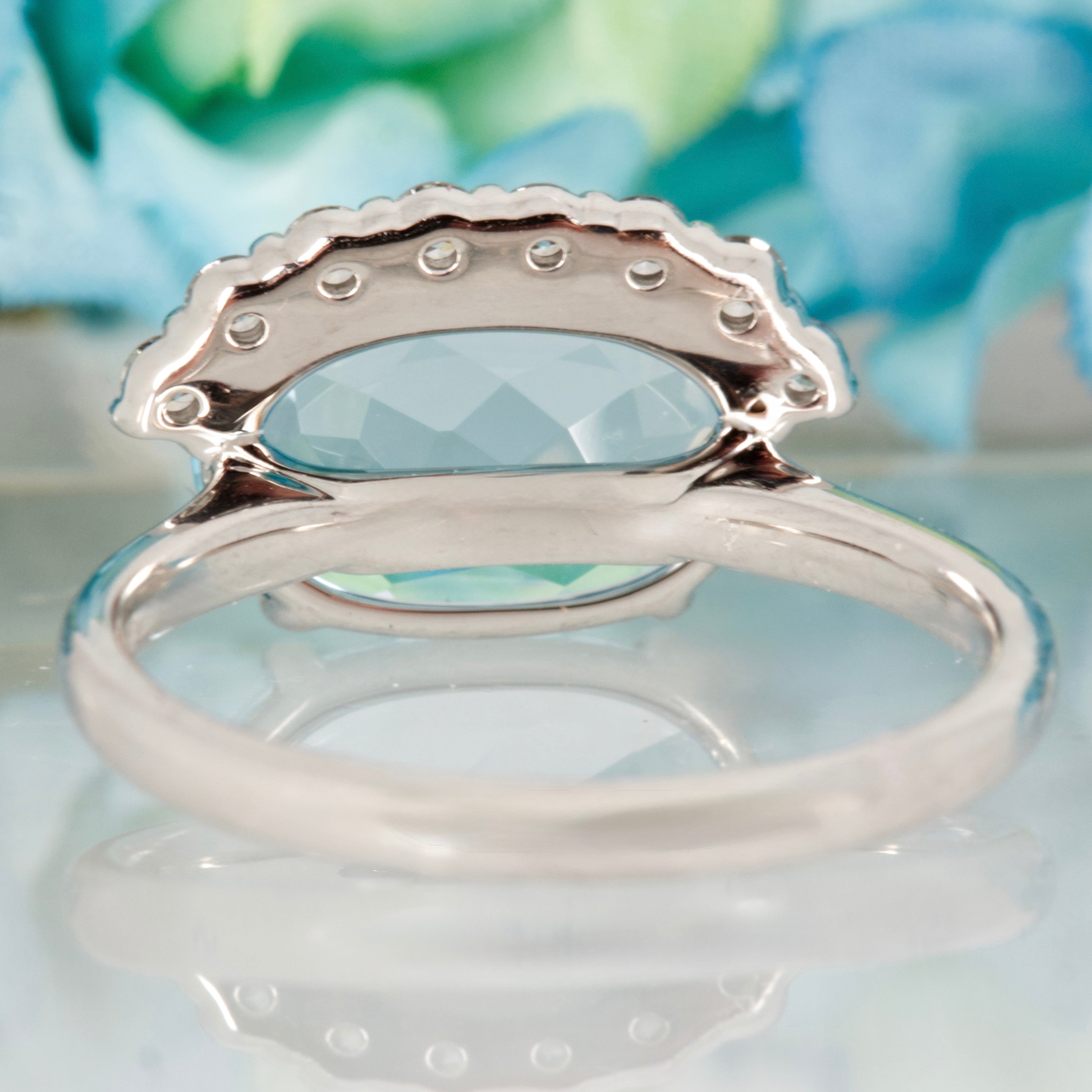 9ct White Gold Oval Cut Blue Topaz & Round Brilliant Cut Diamond Dress Ring