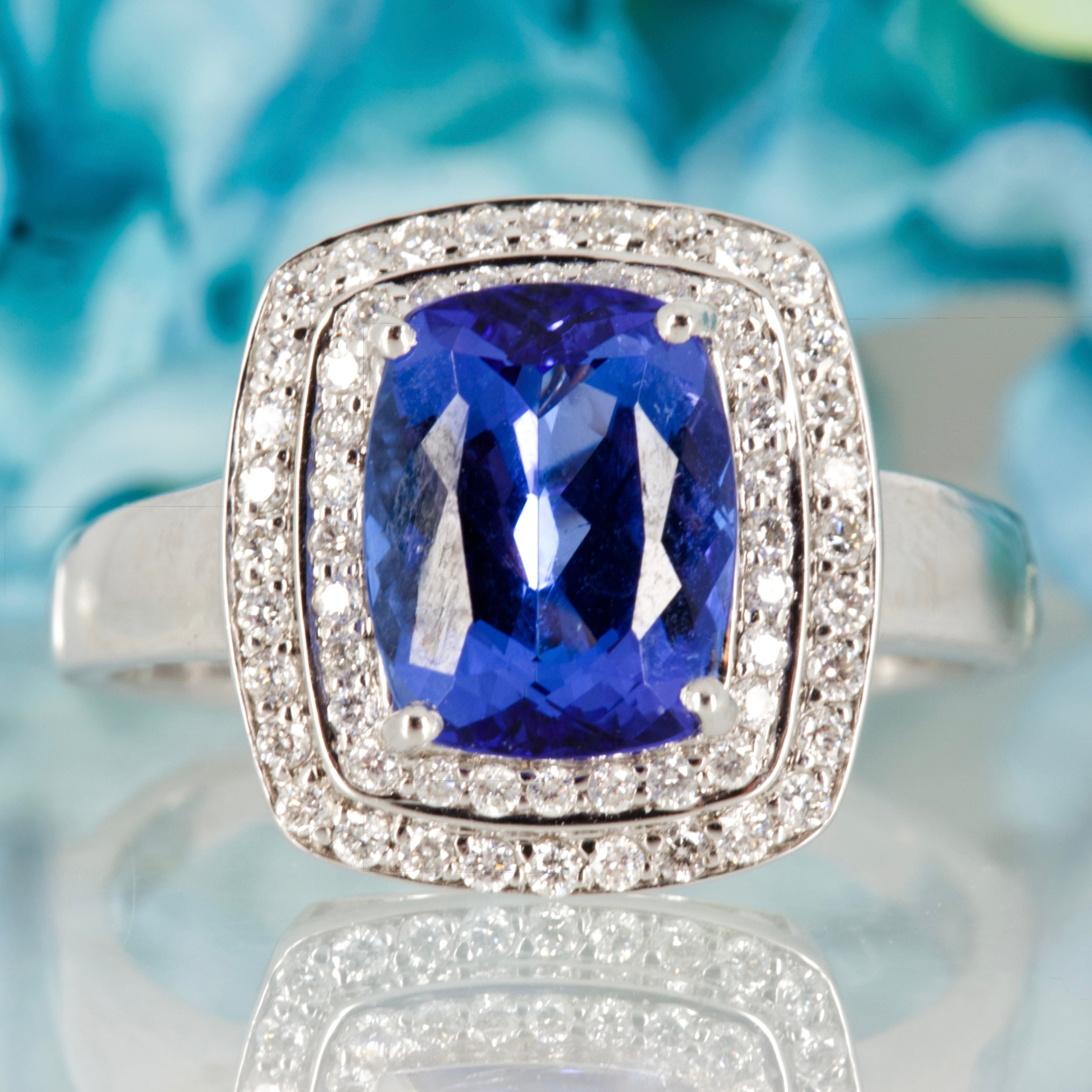 Pre-Loved 18ct White Gold Cushion Cut Tanzanite & Round Brilliant Cut Diamond Double Halo Cluster Ring