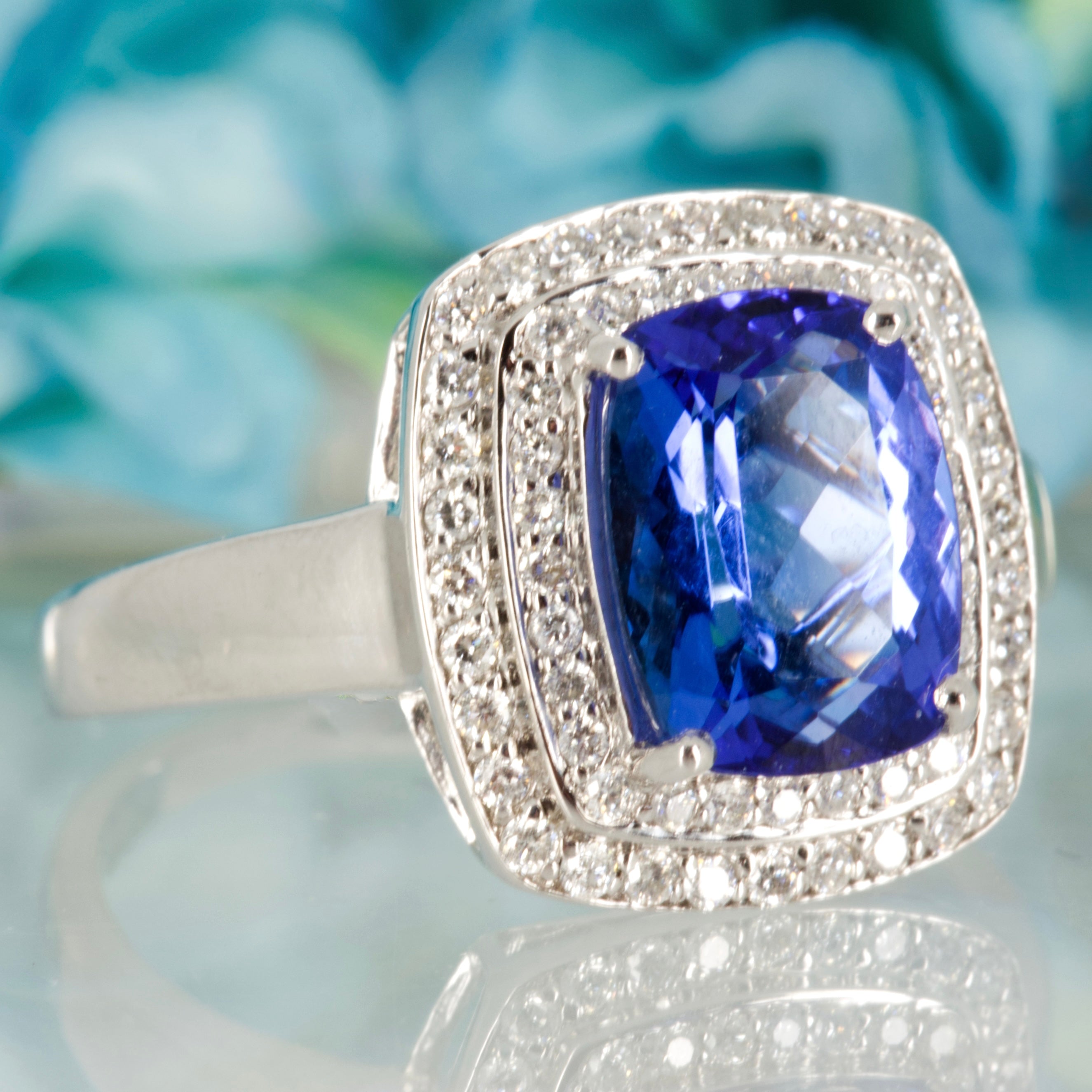 Pre-Loved 18ct White Gold Cushion Cut Tanzanite & Round Brilliant Cut Diamond Double Halo Cluster Ring