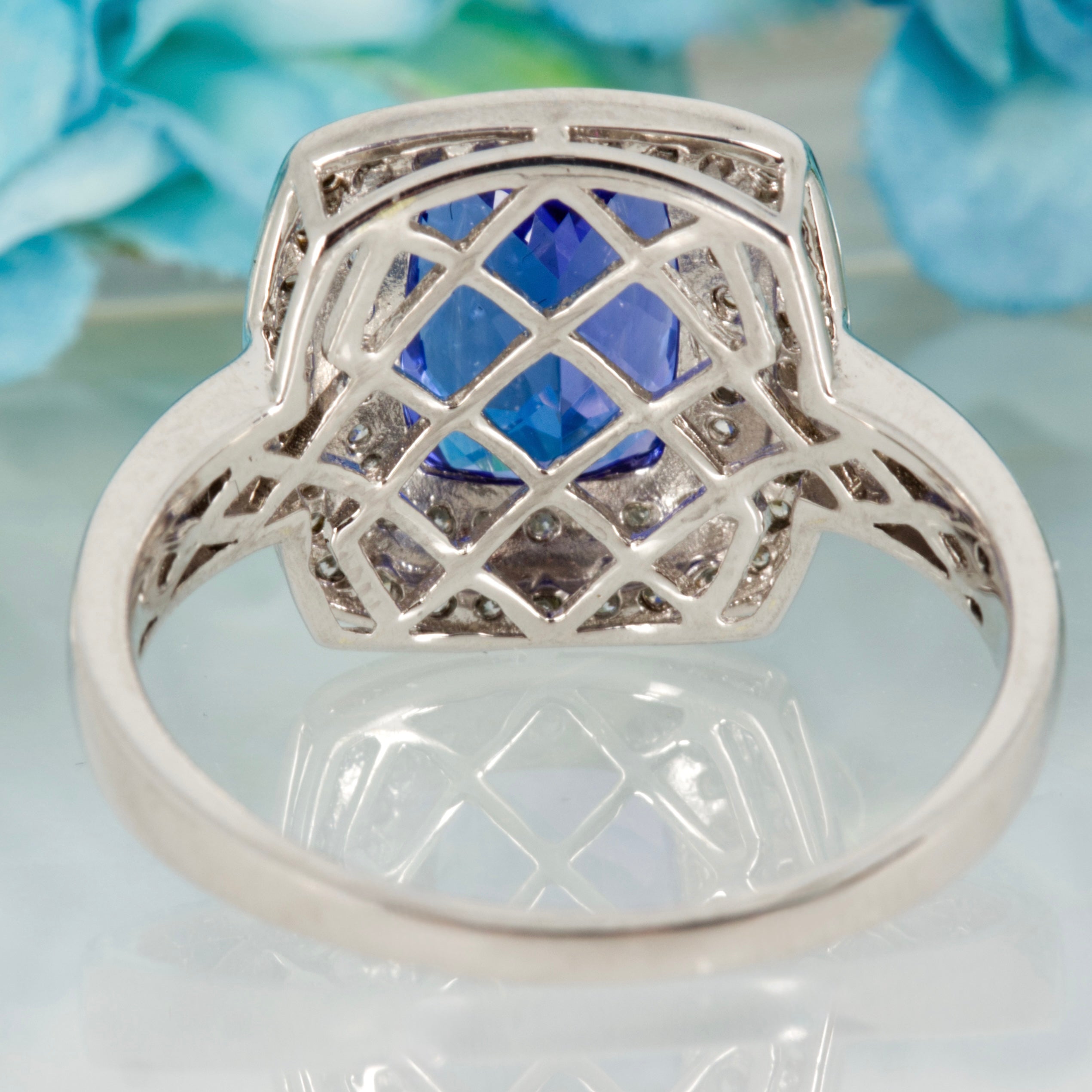 Pre-Loved 18ct White Gold Cushion Cut Tanzanite & Round Brilliant Cut Diamond Double Halo Cluster Ring