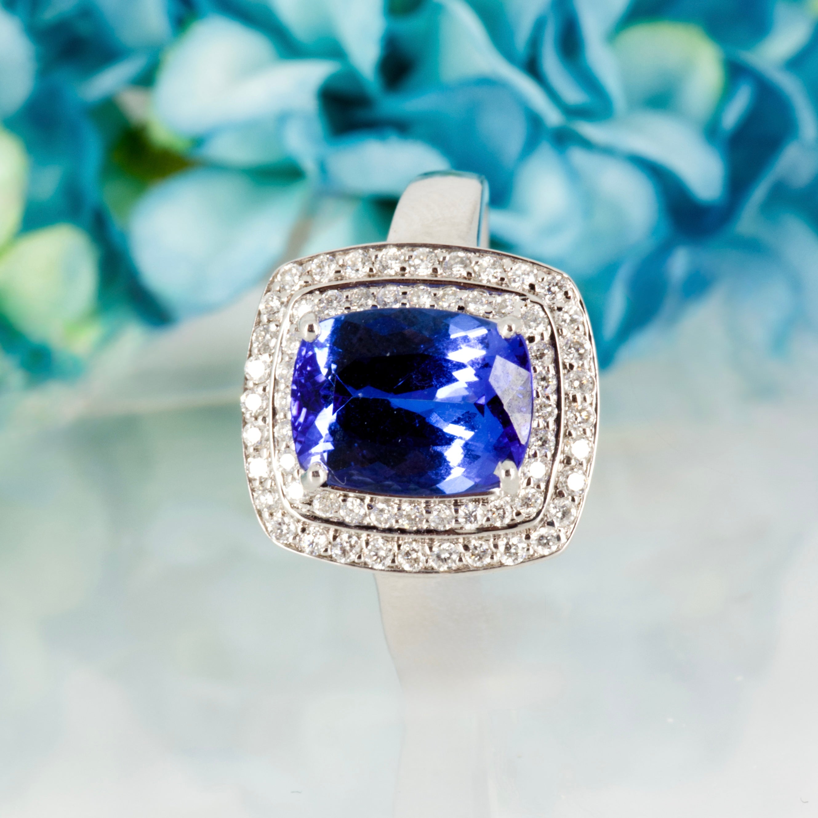 Pre-Loved 18ct White Gold Cushion Cut Tanzanite & Round Brilliant Cut Diamond Double Halo Cluster Ring