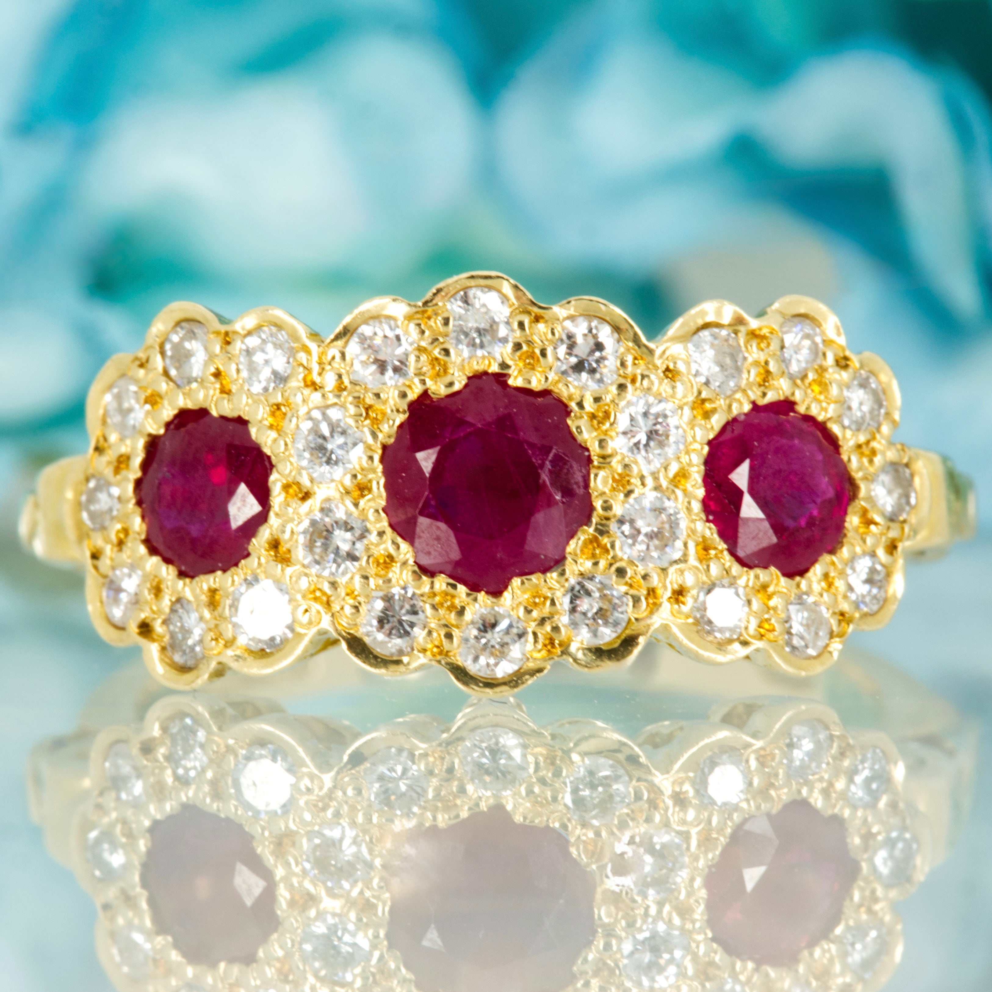 Pre-Loved 18ct Yellow Gold Round Cut Ruby & Round Brilliant Cut Diamond Triple Cluster Ring