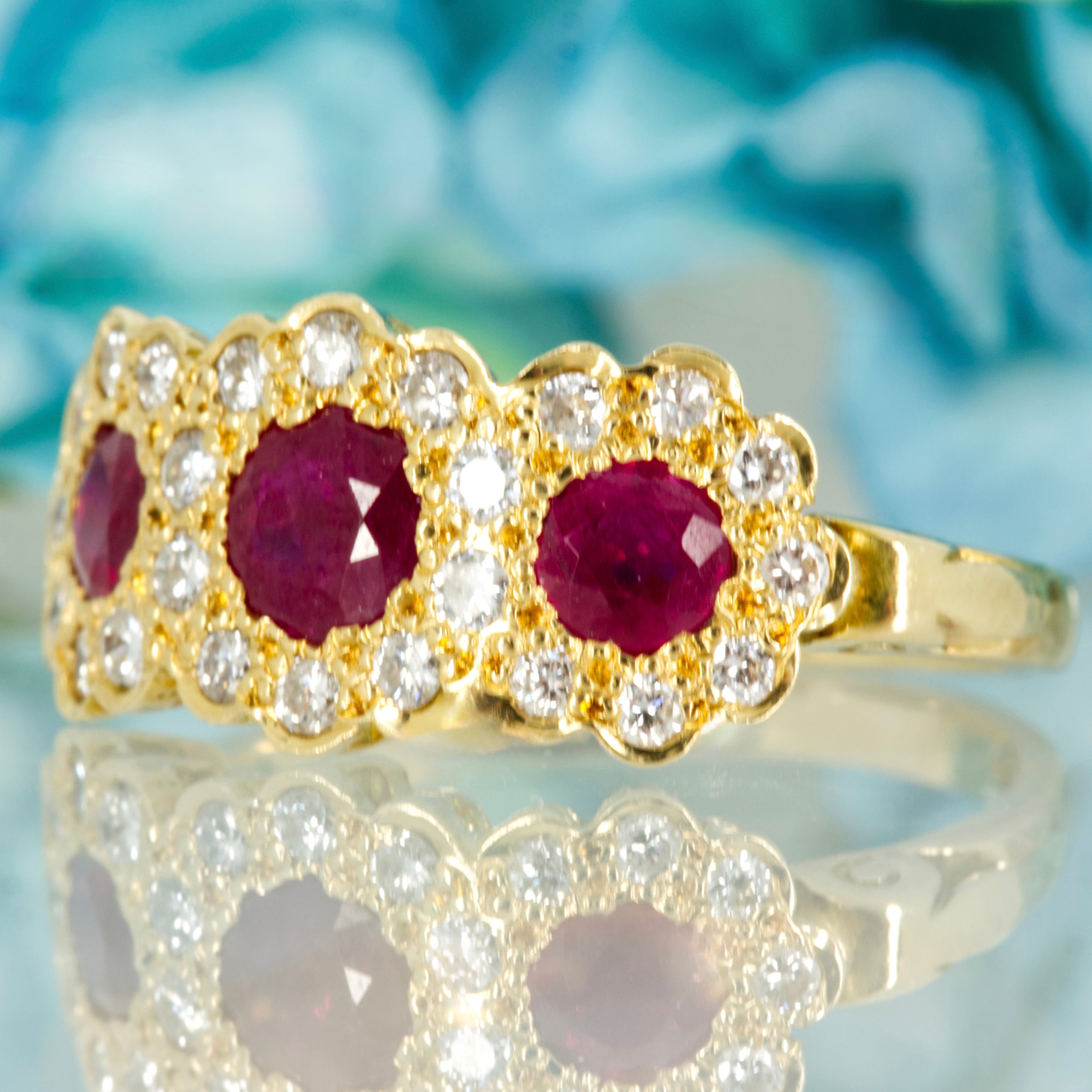 Pre-Loved 18ct Yellow Gold Round Cut Ruby & Round Brilliant Cut Diamond Triple Cluster Ring