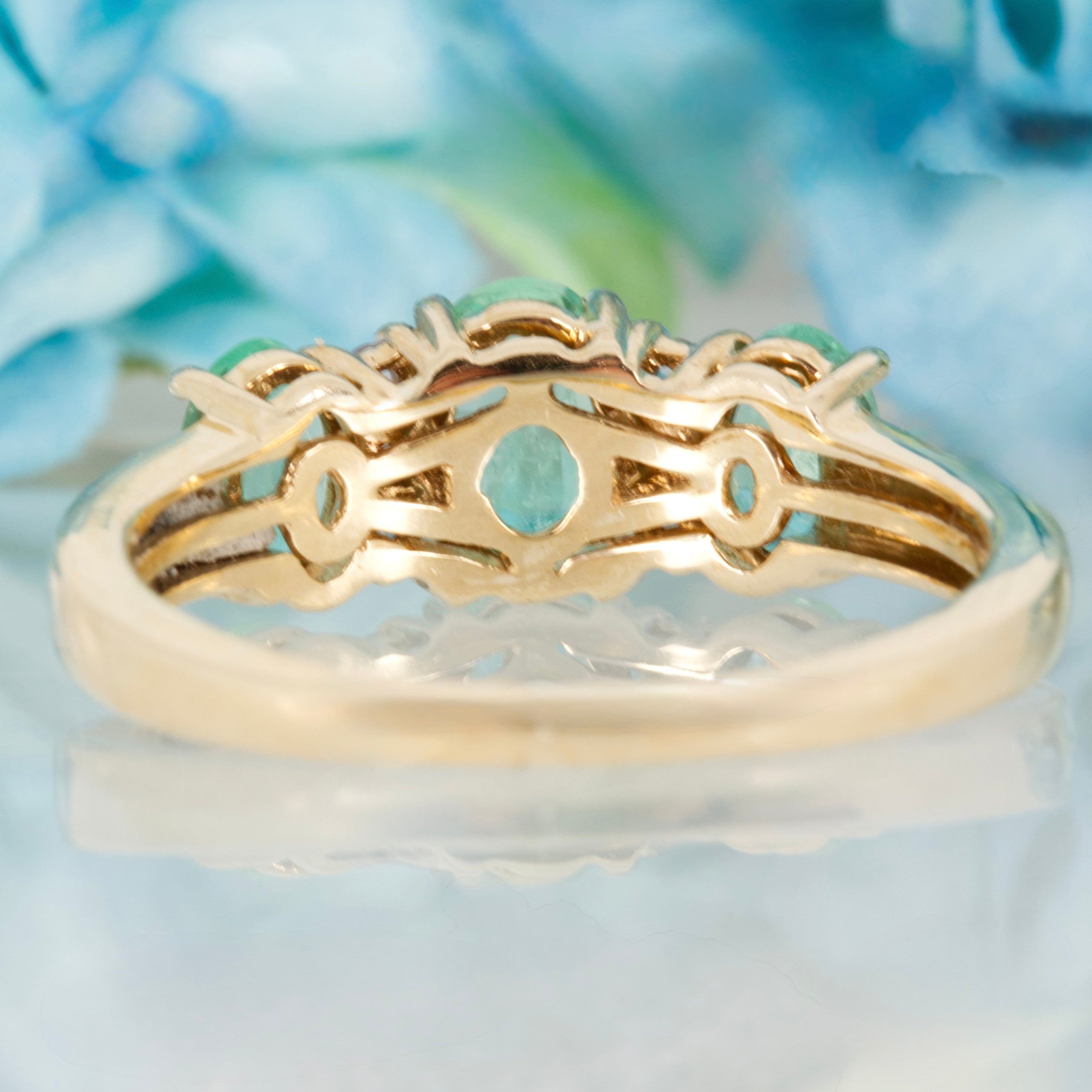 Pre-Loved 9ct Yellow Gold Oval Cut Emerald & Round Cut White Stone Dress Ring