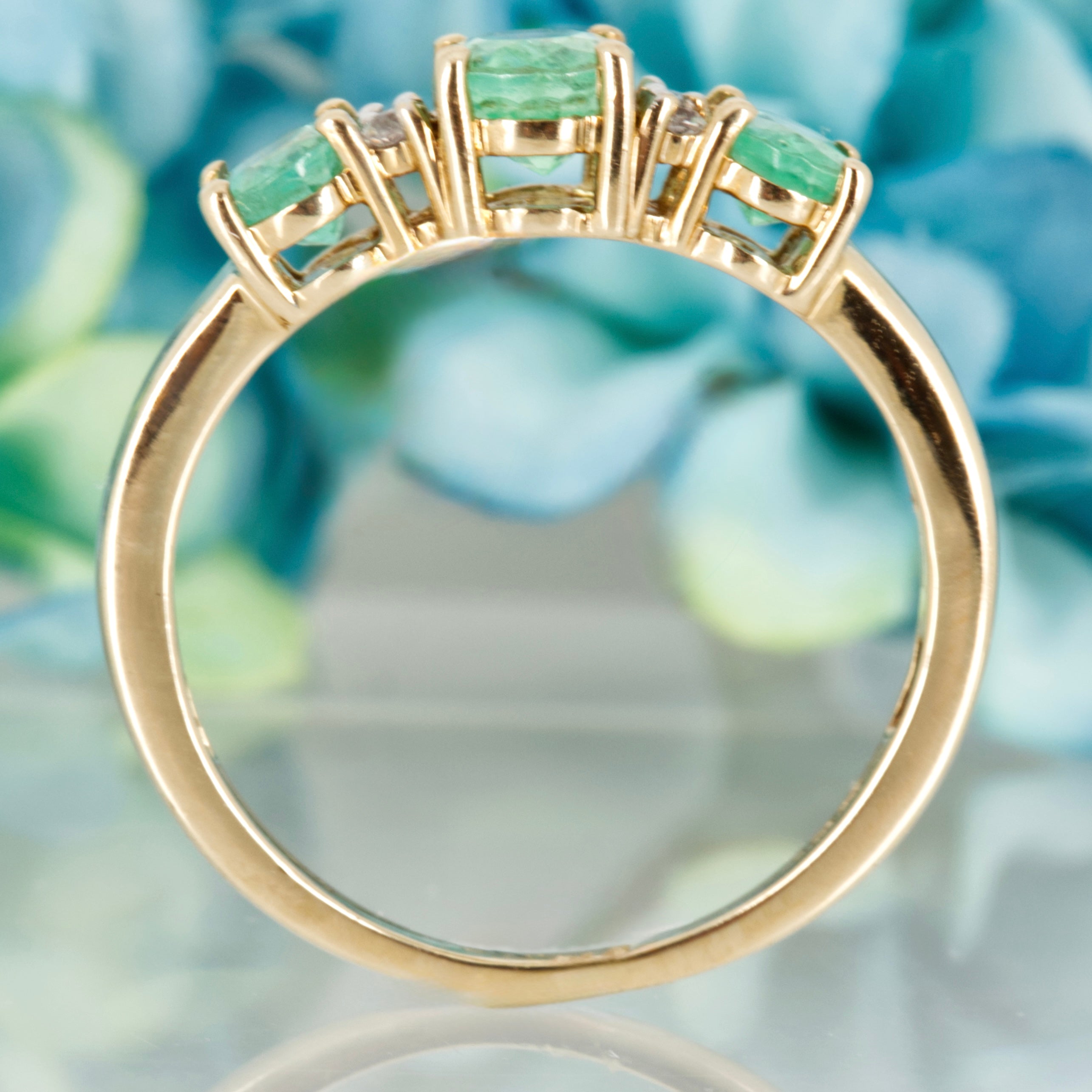 Pre-Loved 9ct Yellow Gold Oval Cut Emerald & Round Cut White Stone Dress Ring