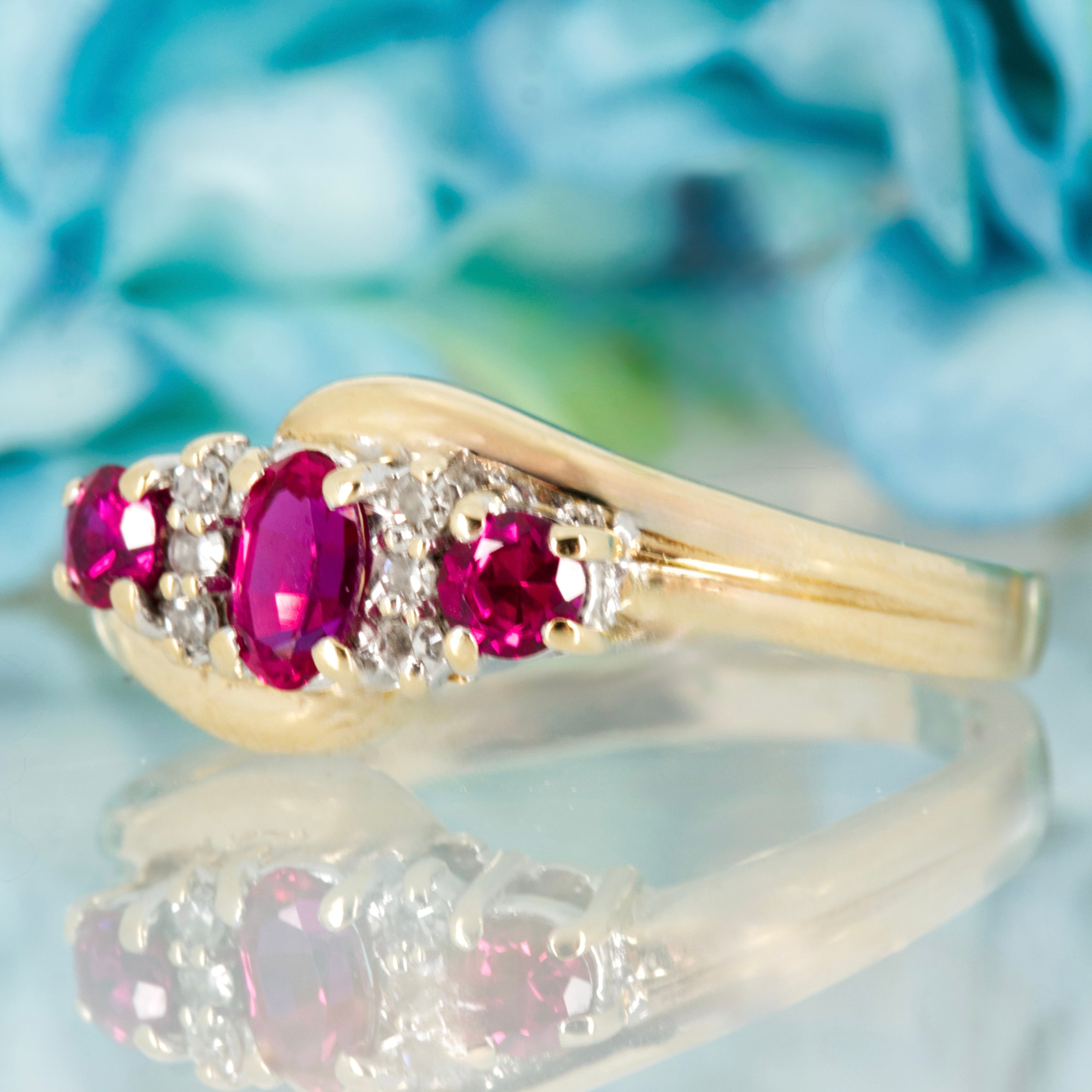 Pre-Loved 9ct Yellow Gold Oval & Round Cut Ruby & Round Brilliant Cut Diamond Dress Ring