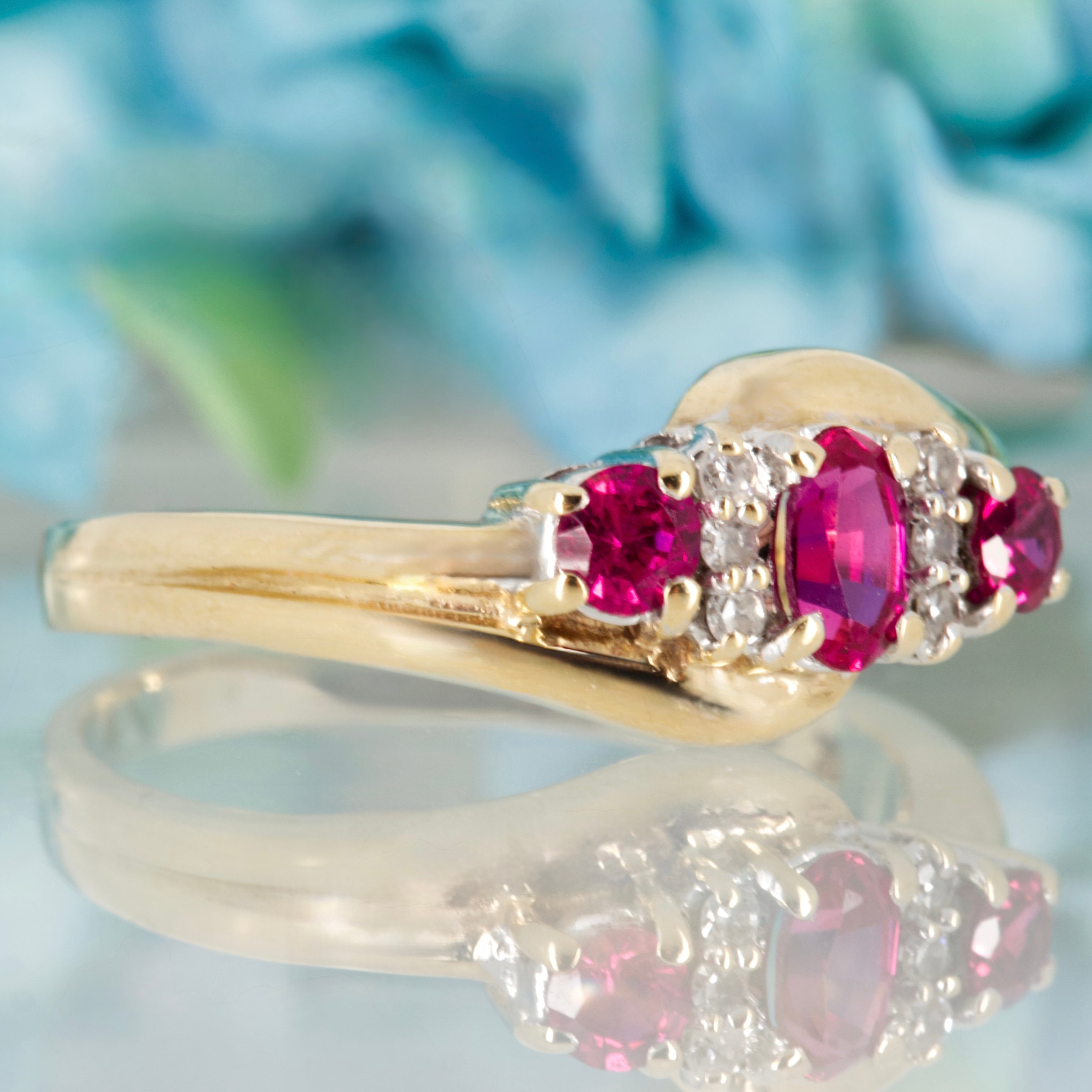 Pre-Loved 9ct Yellow Gold Oval & Round Cut Ruby & Round Brilliant Cut Diamond Dress Ring
