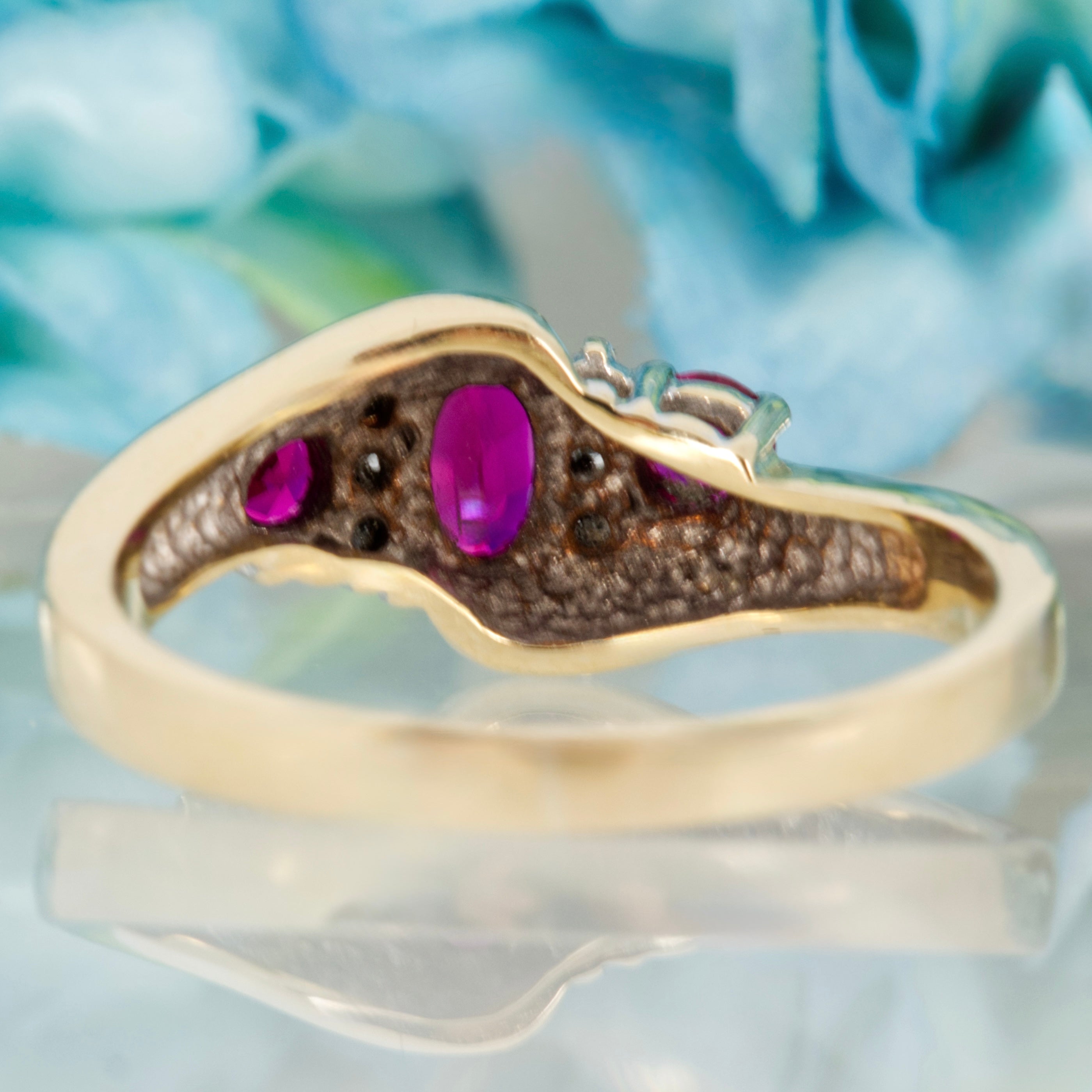 Pre-Loved 9ct Yellow Gold Oval & Round Cut Ruby & Round Brilliant Cut Diamond Dress Ring