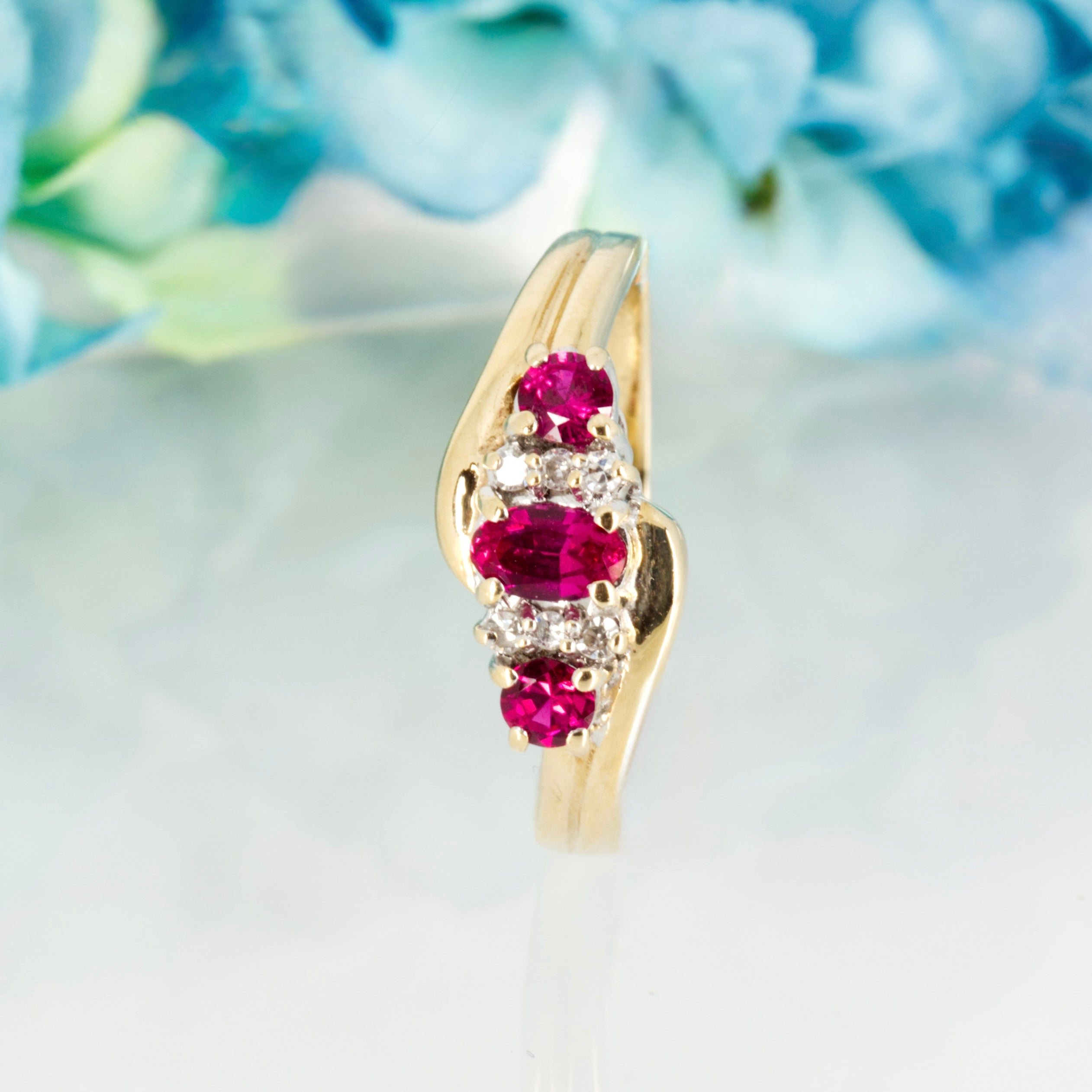 Pre-Loved 9ct Yellow Gold Oval & Round Cut Ruby & Round Brilliant Cut Diamond Dress Ring