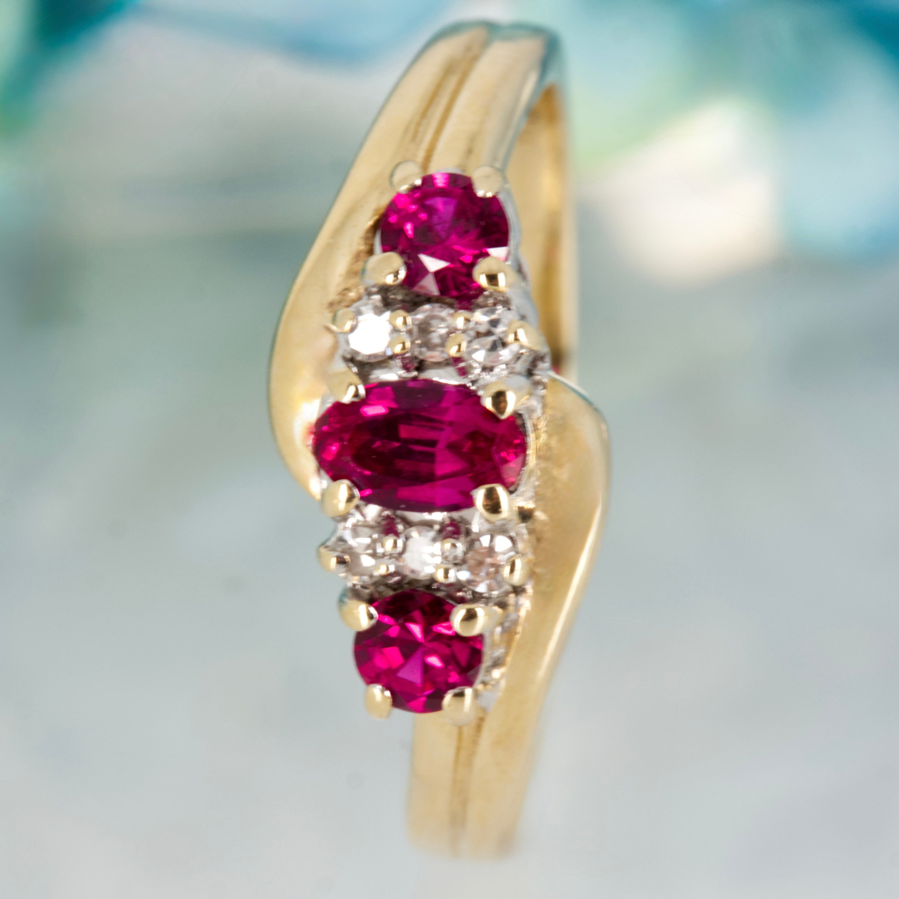 Pre-Loved 9ct Yellow Gold Oval & Round Cut Ruby & Round Brilliant Cut Diamond Dress Ring