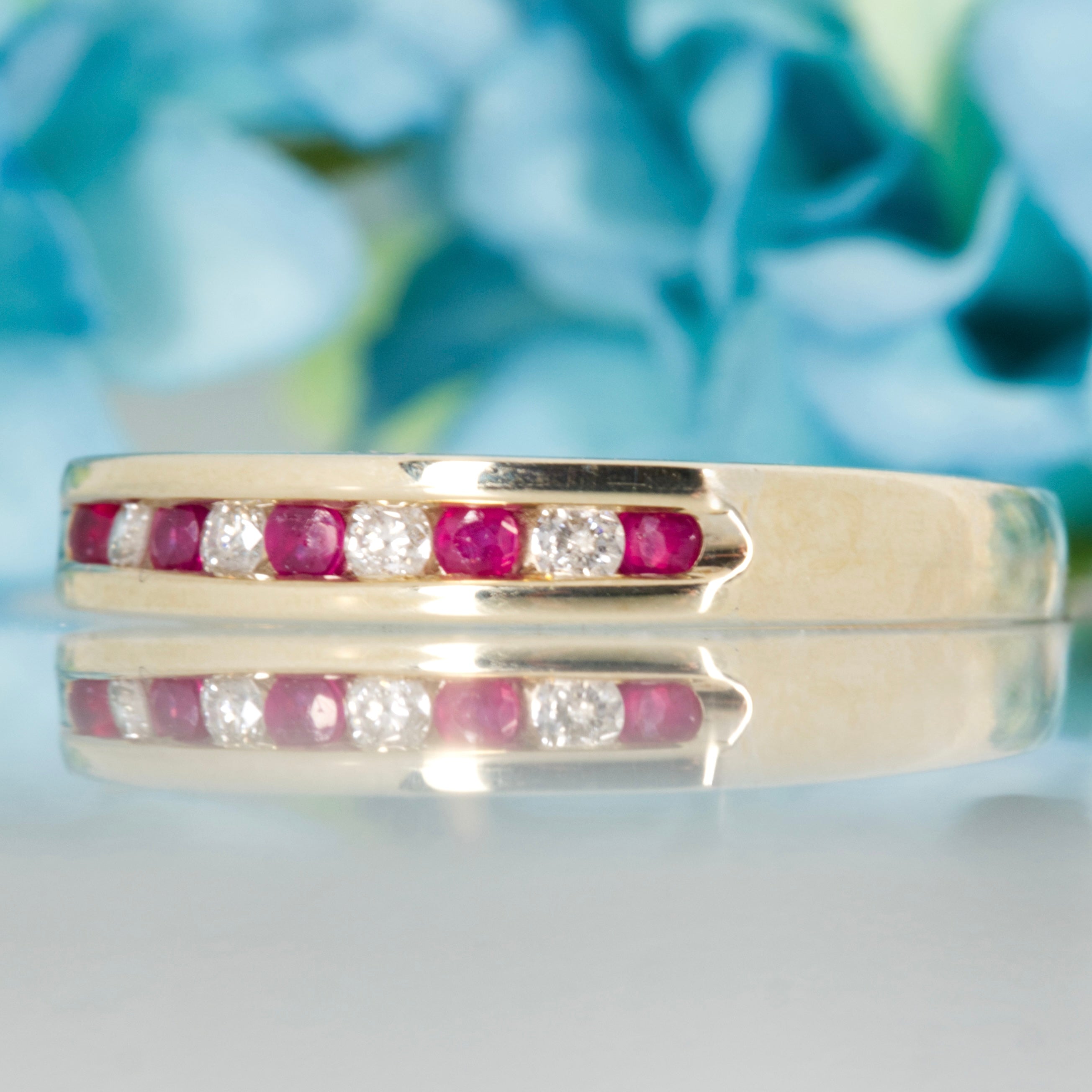 Pre-Loved 9ct Yellow Gold Round Cut Ruby & Round Brilliant Cut Diamond Channel Set Half Eternity Ring