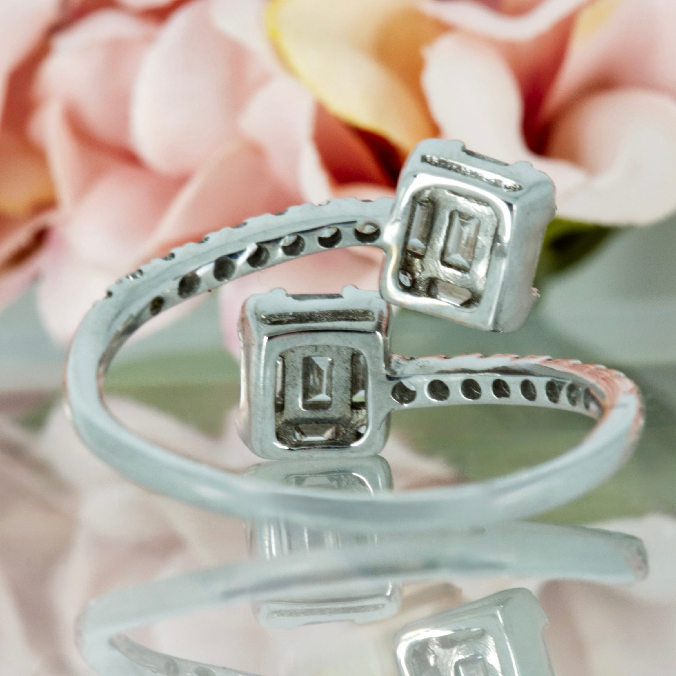 Pre-Loved 18ct White Gold 0.70ct Baguette & Round Brilliant Cut Diamond Crossover Cluster Ring