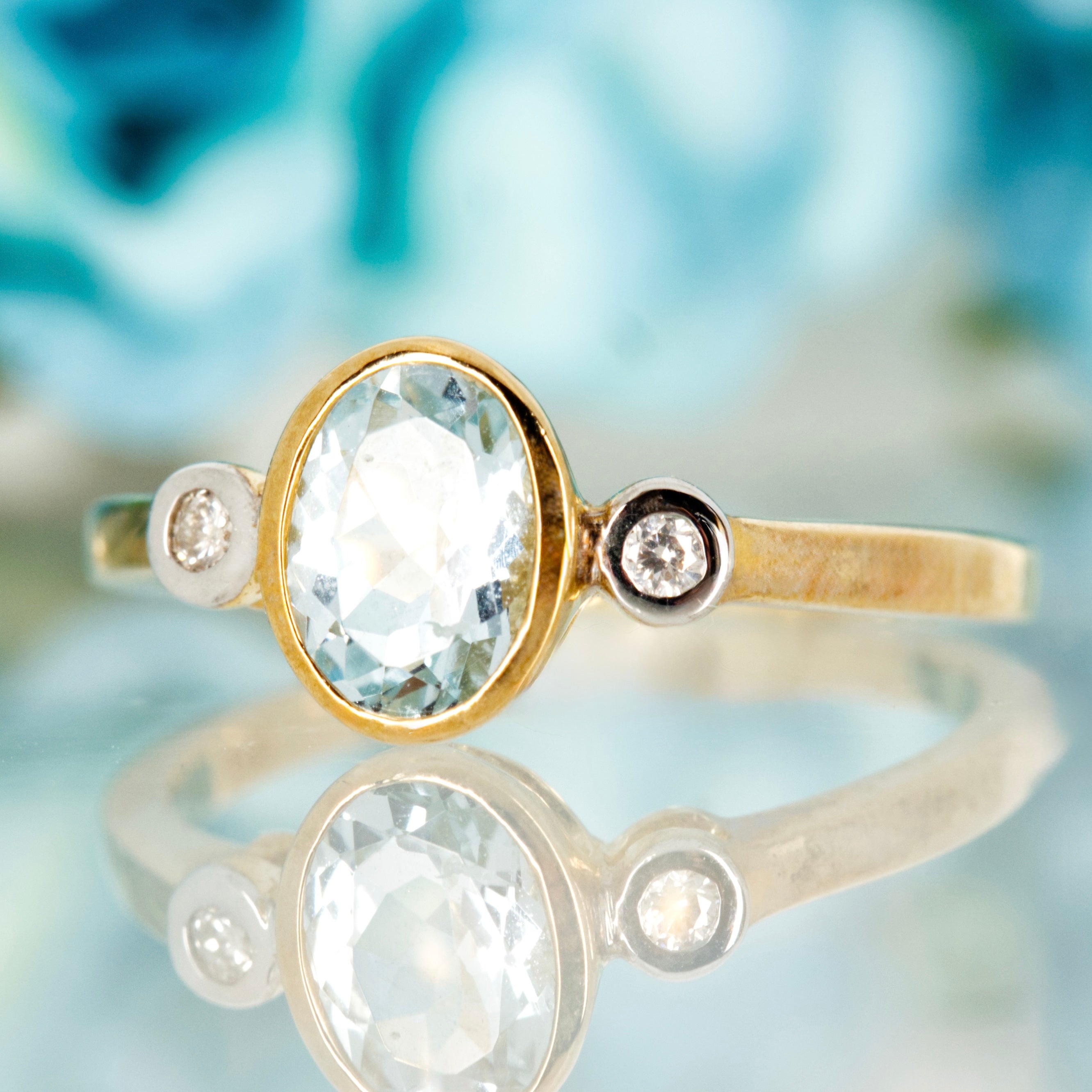9ct Yellow Gold Oval Cut Aquamarine & Round Brilliant Cut Diamond Trilogy Ring