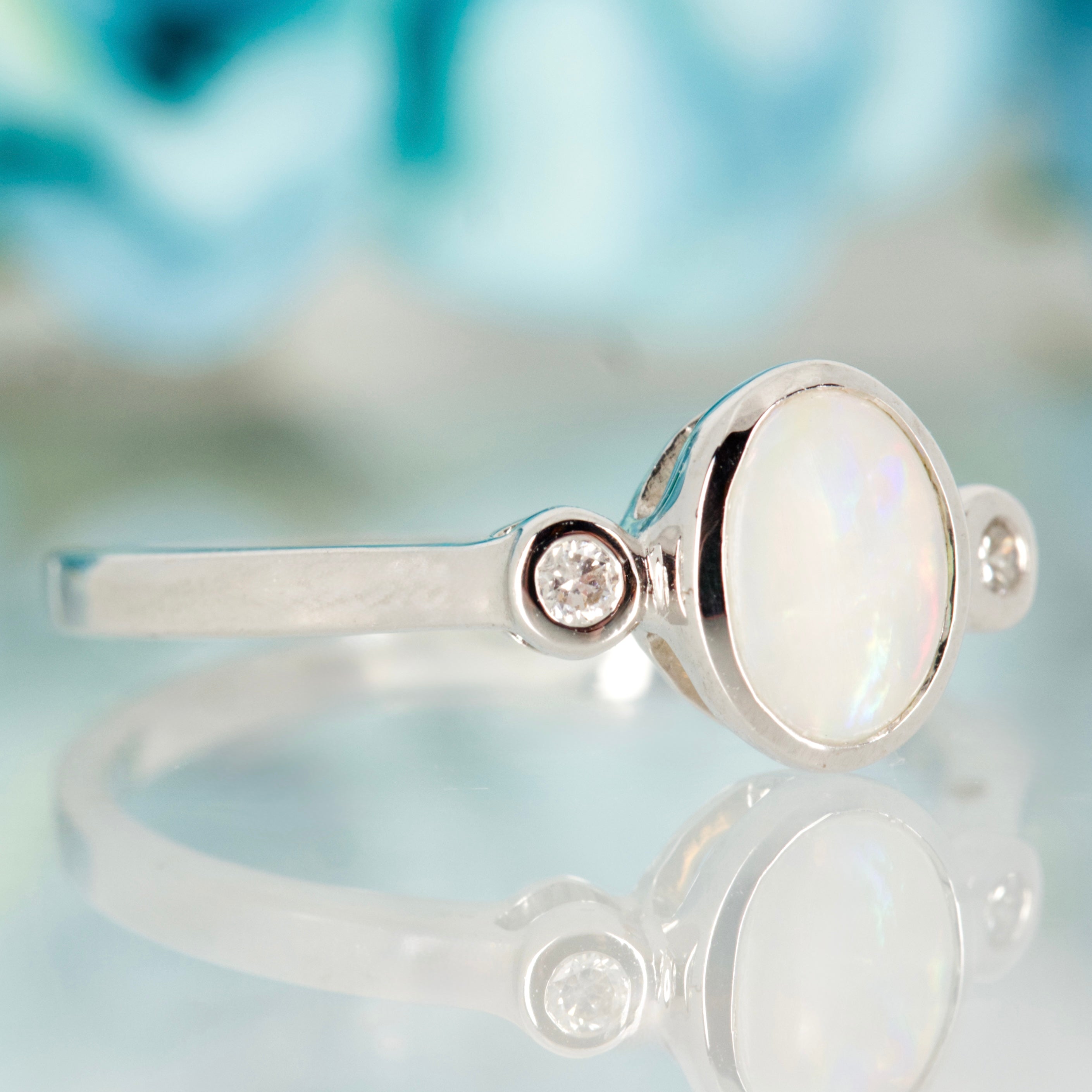 9ct White Gold Oval Opal & Round Brilliant Cut Diamond Trilogy Ring